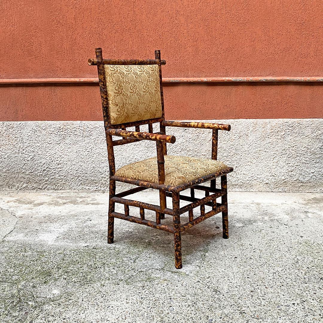 Italian antique colonial bamboo and original fabric chair with armrests, 1910s
Colonial chair with wooden frame with round section strips, armrests and bamboo upholstery. Seat and back upholstered and covered in their original damask