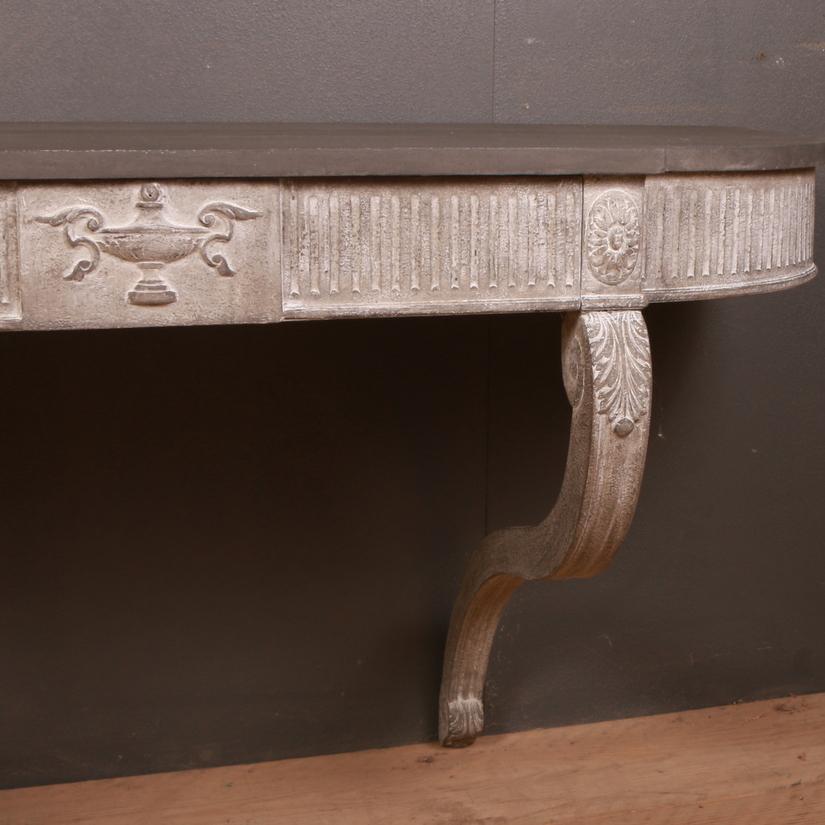 Pretty antique wall mounted console table with one drawer, 1880

Dimensions
48 inches (122 cms) wide
18 inches (46 cms) deep
26.5 inches (67 cms) high.

 