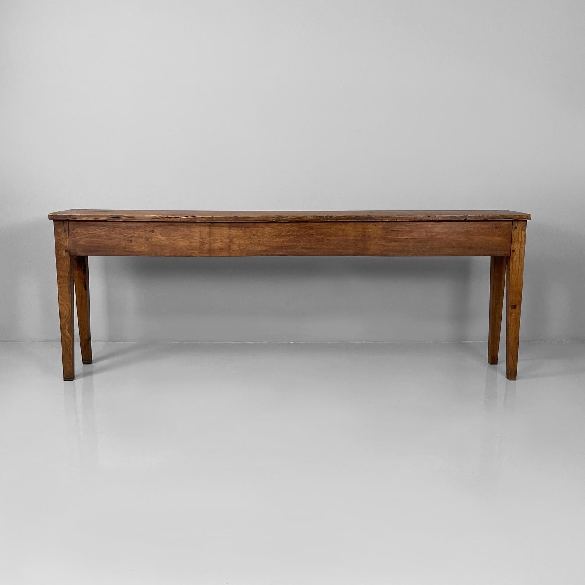 Italian antique console table in wood, 1930s
Console table made entirely of wood. The rectangular tabletop is supported by four rectangular legs.
1930s
Fair condition. Scattered signs of age and use.
Measurement in cm 198.5x36x74h
this elegant and