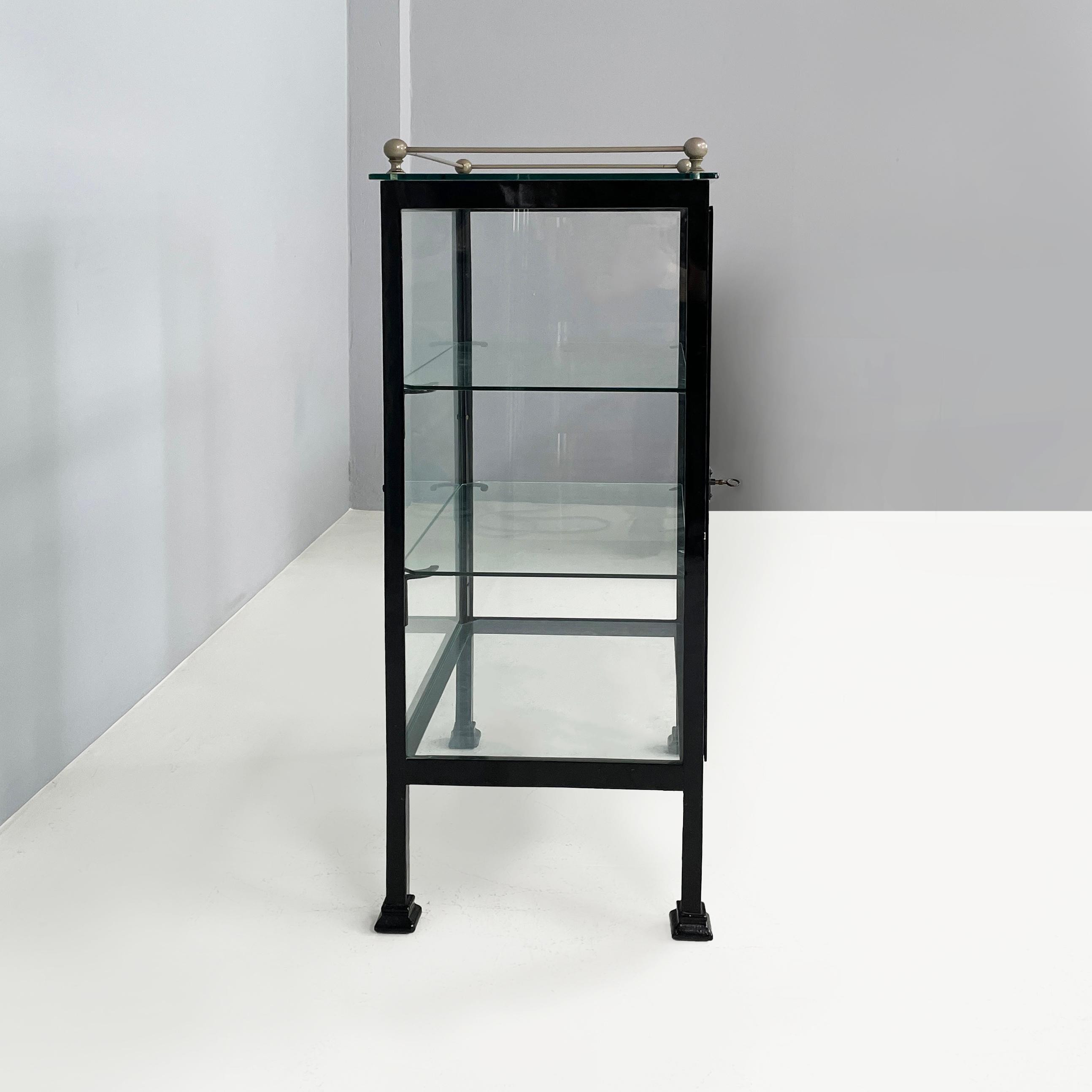 Metal Italian antique Display cabinet in glass and black metal, early 1900s For Sale