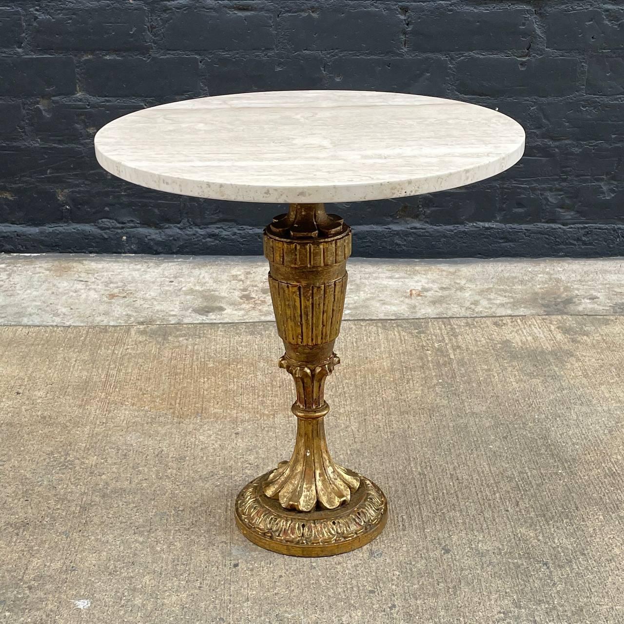 Italian Antique Gold Leaf Gilded Side Table with Travertine Top

Country: Italy 
Materials: Gold Leaf Gilded Wood
Style: Italian Antique
Year: 1920s

$1,895

Dimensions 
21.25”H x 20”W x 20”D.