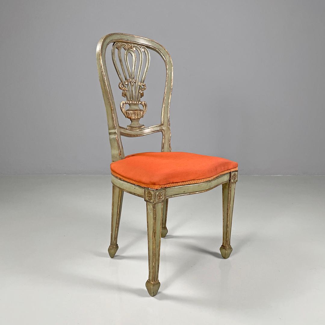 Italian antique green and gold wooden chairs with orange cushions, 1700s
Set of six chairs with padded seats and covered with an orange fabric and trimmings of the same tone. The structure is in light green painted wood with golden profiles and