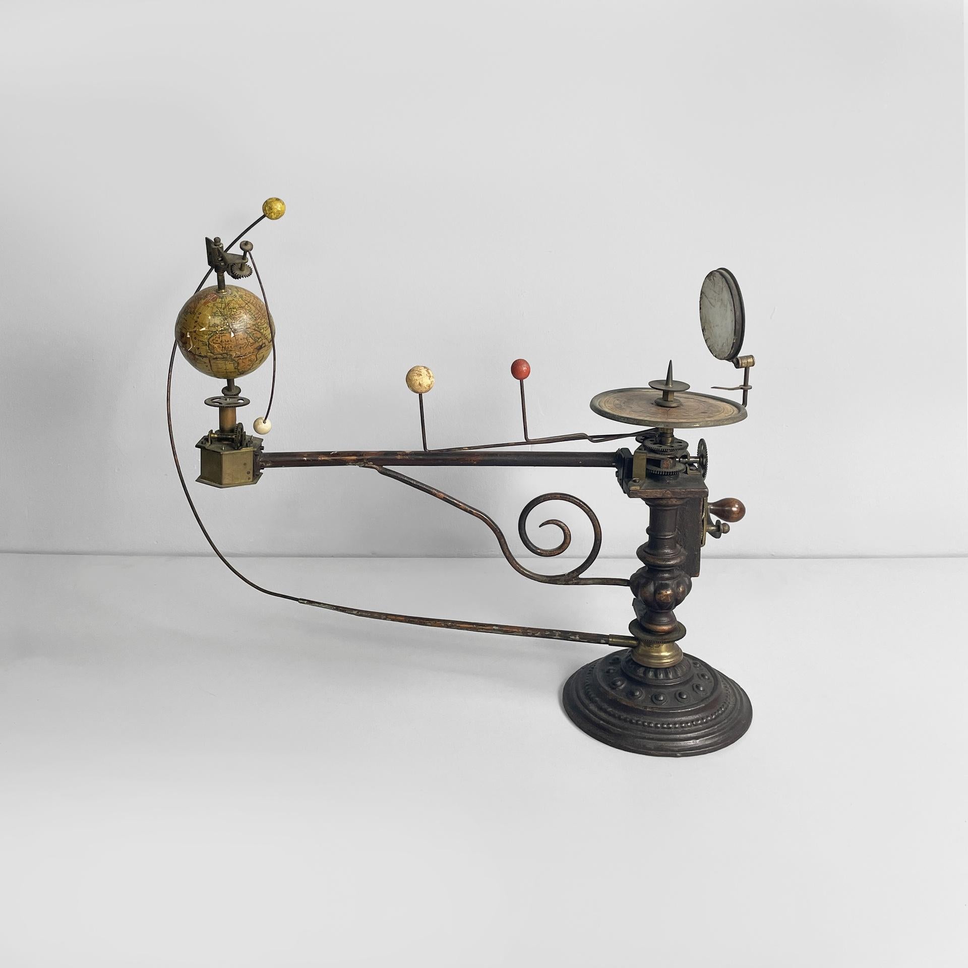 Italian antique mechanical tellurium in brass and cast iron, mid 1800s
Mechanical tellurium made of brass and cast iron. This scientific instrument is composed of paper-covered plaster spheres, representing the planets of the solar system: Mercury,