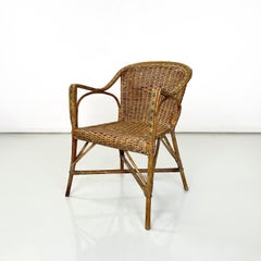 Italienischer antiker Rattanstuhl mit Armlehnen und grünen Details, Anfang 1900