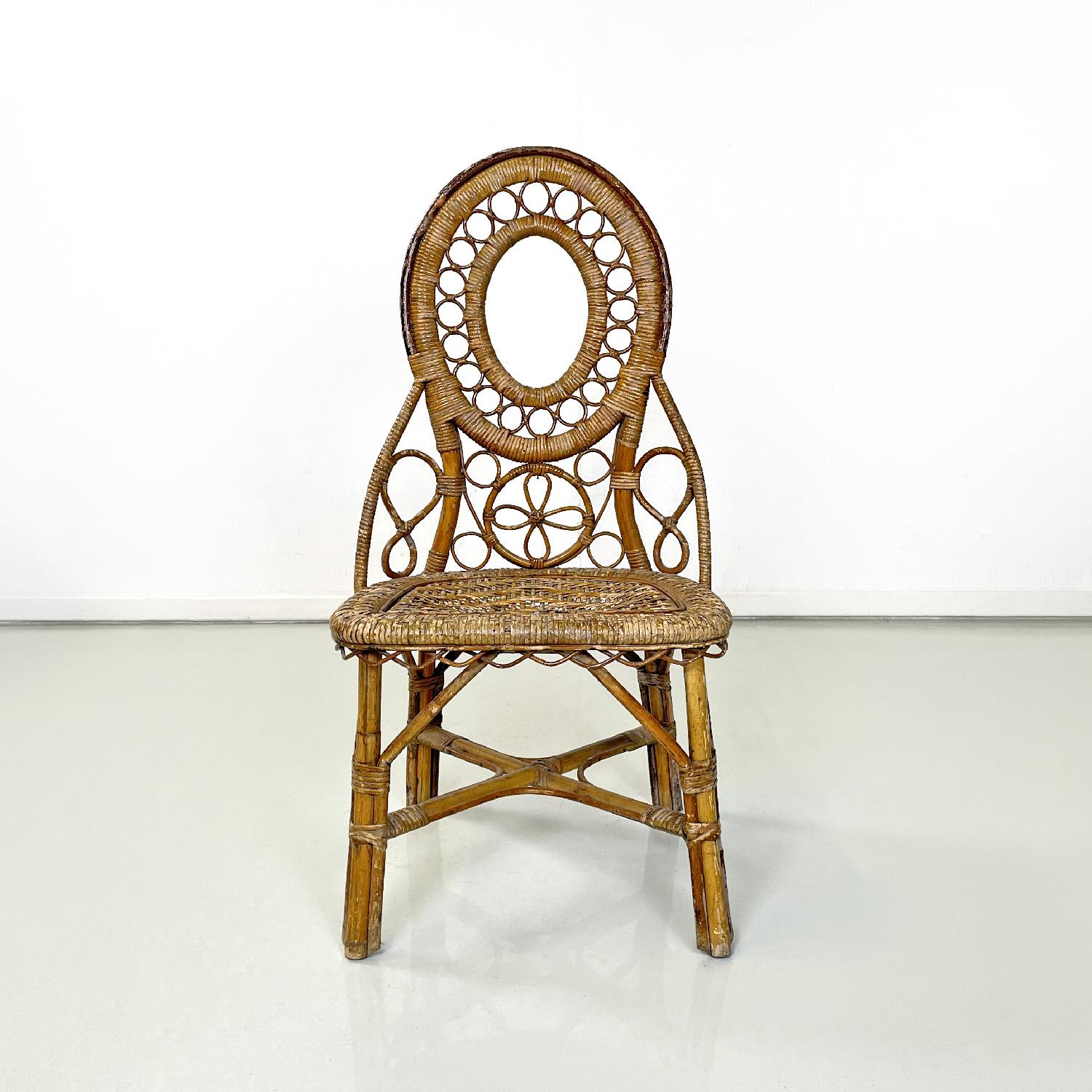 Italian antique rattan chair with floral and geometric decoration, early 1900s
Rattan chair with backrest finely decorated with rounded and floral shapes. The seat has a geometric weave and a rounded profile, the four legs are joined in the center