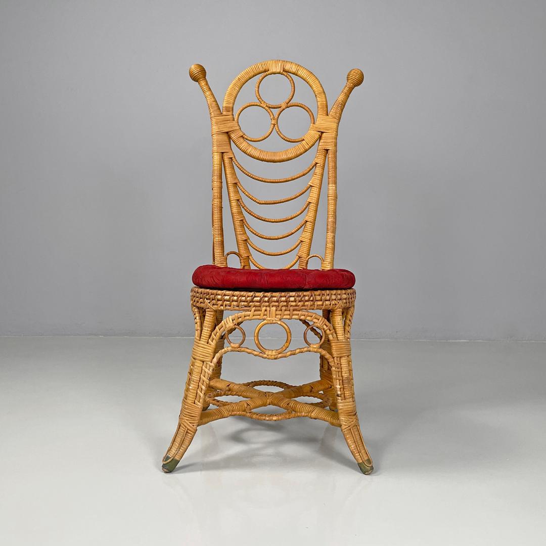 Italian antique rattan chairs with round decorations and red pillows early 1900s In Fair Condition For Sale In MIlano, IT