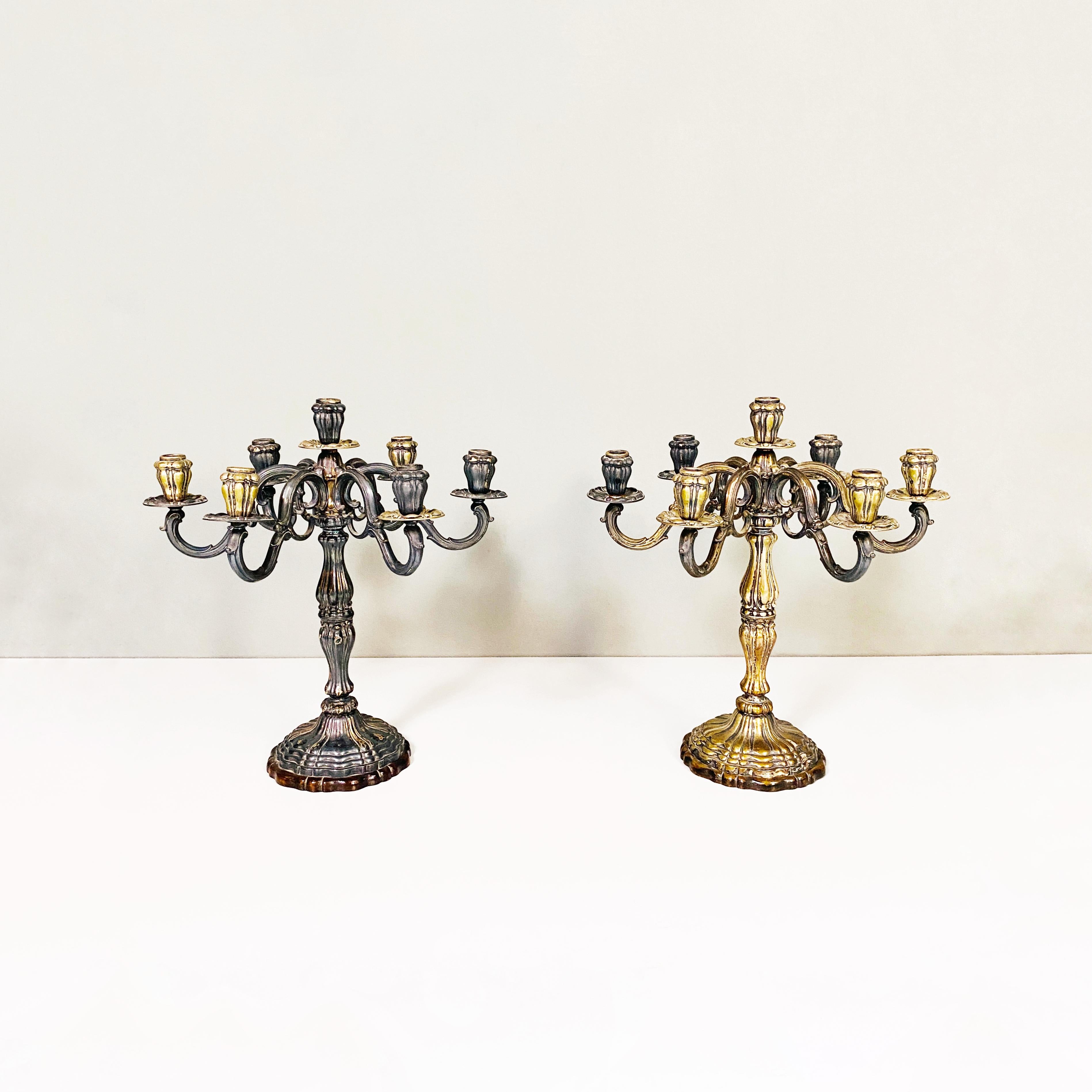 Seven-flame silver candelabras, 1880s
Silver candelabras of the late nineteenth century with seven flames and wooden base, entirely handmade.

Good conditions

Measurements in cm 46x46x49h.