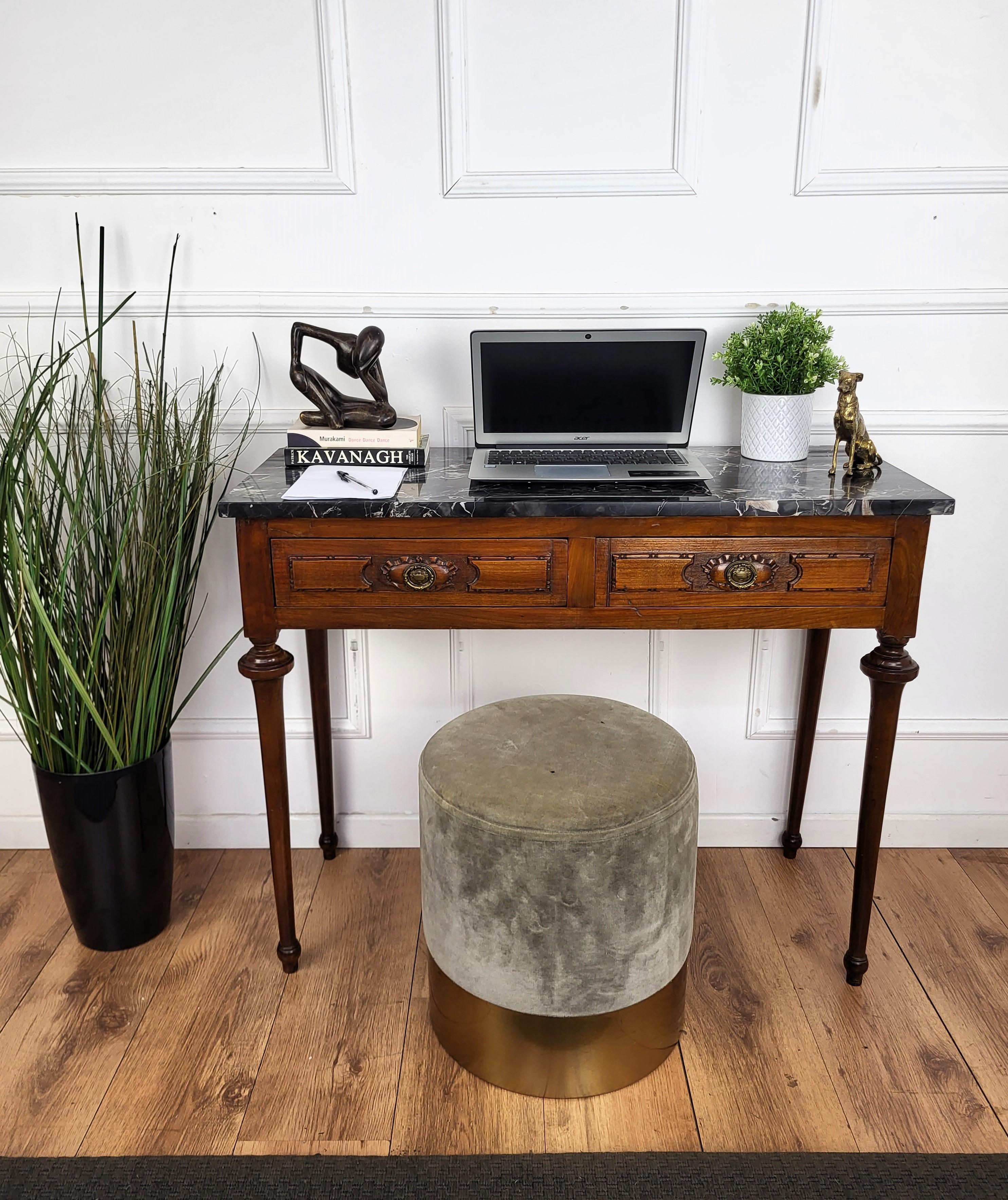 Very charming and elegant small Italian antique desk writing table or console table with stylish shaped legs, solid wood and two central drawers with brass handles and completed by the beautiful Portoro marble top. Portoro is a high-quality black