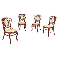 Italian antique wood and Vienna straw chairs with curl details, early 1900s