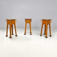 Italian antique wood pedestals with curved profiles and decorations, early 1900s