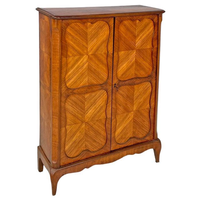 Italian antique wooden cabinet with decorated doors and key, late 1800s