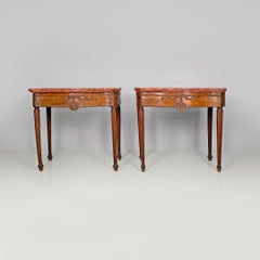 Italian antique wooden consoles with red marble tops and decorations, 1600s