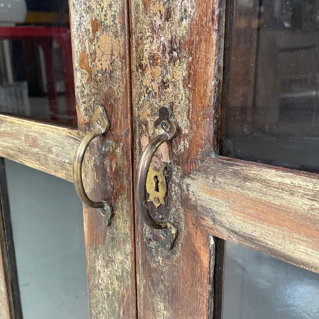 Italian antique wooden cupboard with glass doors and brass handles, early 1900s 10