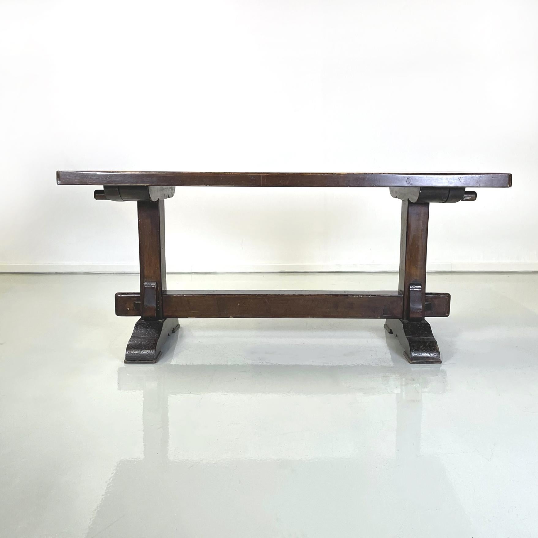 Italian antique Wooden rectangular dining table, early 1900s
Dining table with rectangular wooden top. The top is supported by two legs, joined in the middle by a crossbeam. In eighteenth-century style.
Early 1900s
Very good conditions, in
