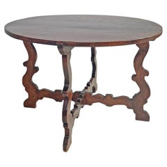 Italian Antique wooden round dining table with decorated legs, early 1800s