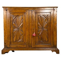 Italian antique wooden storage unit or sideboard with relief design, 1600s