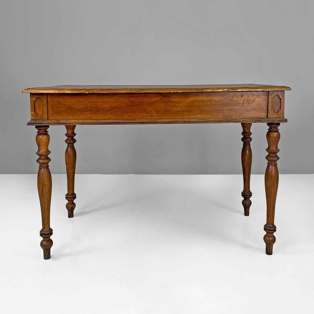 Early 19th Century Italian antique wooden table with two drawers and turned legs, 1800s For Sale