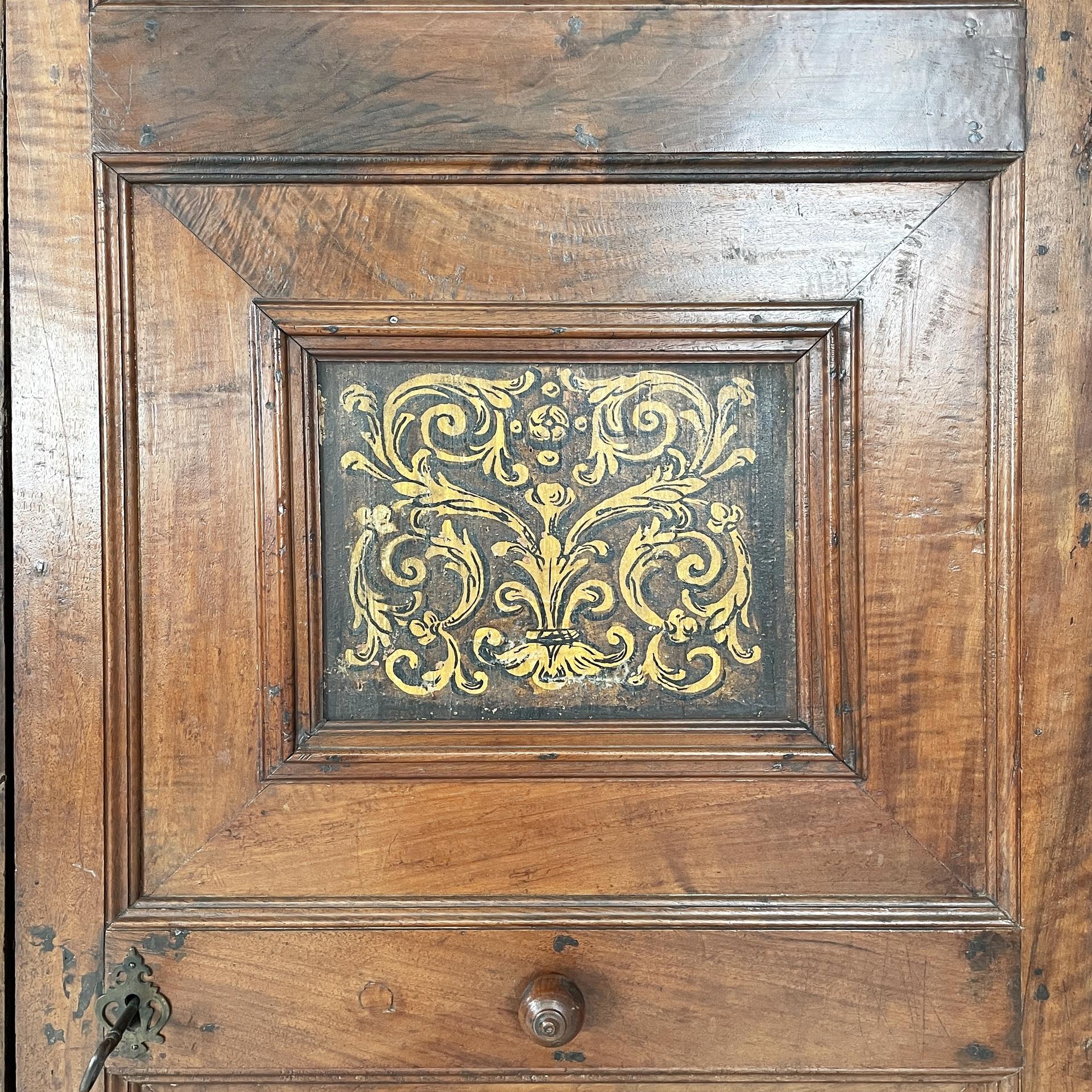 Legno Italian antique wooden wardrobe with decorated doors, 1800s in vendita
