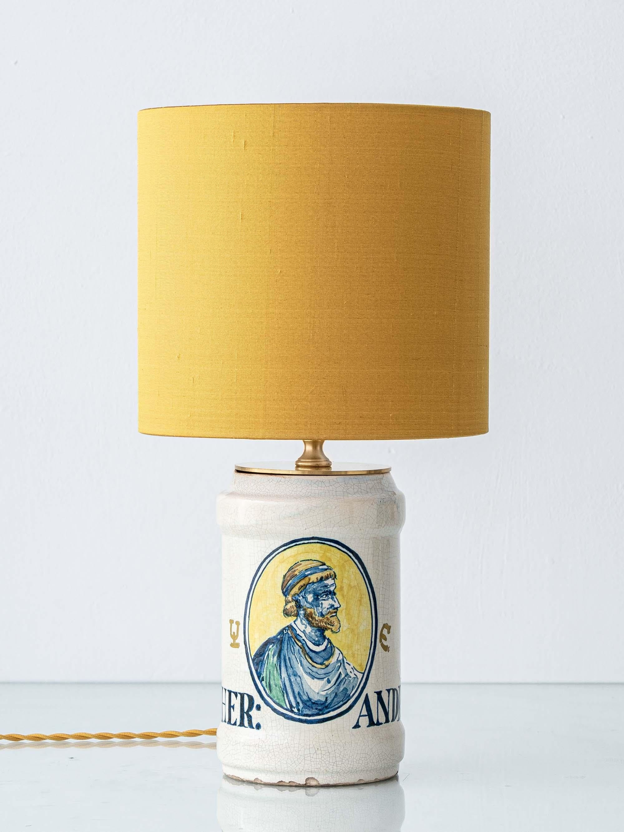 Exquisitely handcrafted by Amitābha Studio from a 19th-century Italian Renaissance revival albarello (circa 1870–1885), this one-of-a-kind table lamp preserves the spirit of Europe’s great apothecary traditions. The ceramic vessel once served as a