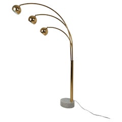 Italian Arch floor lamp in Gilded Metal and Marble attributable to Reggiani, 70s