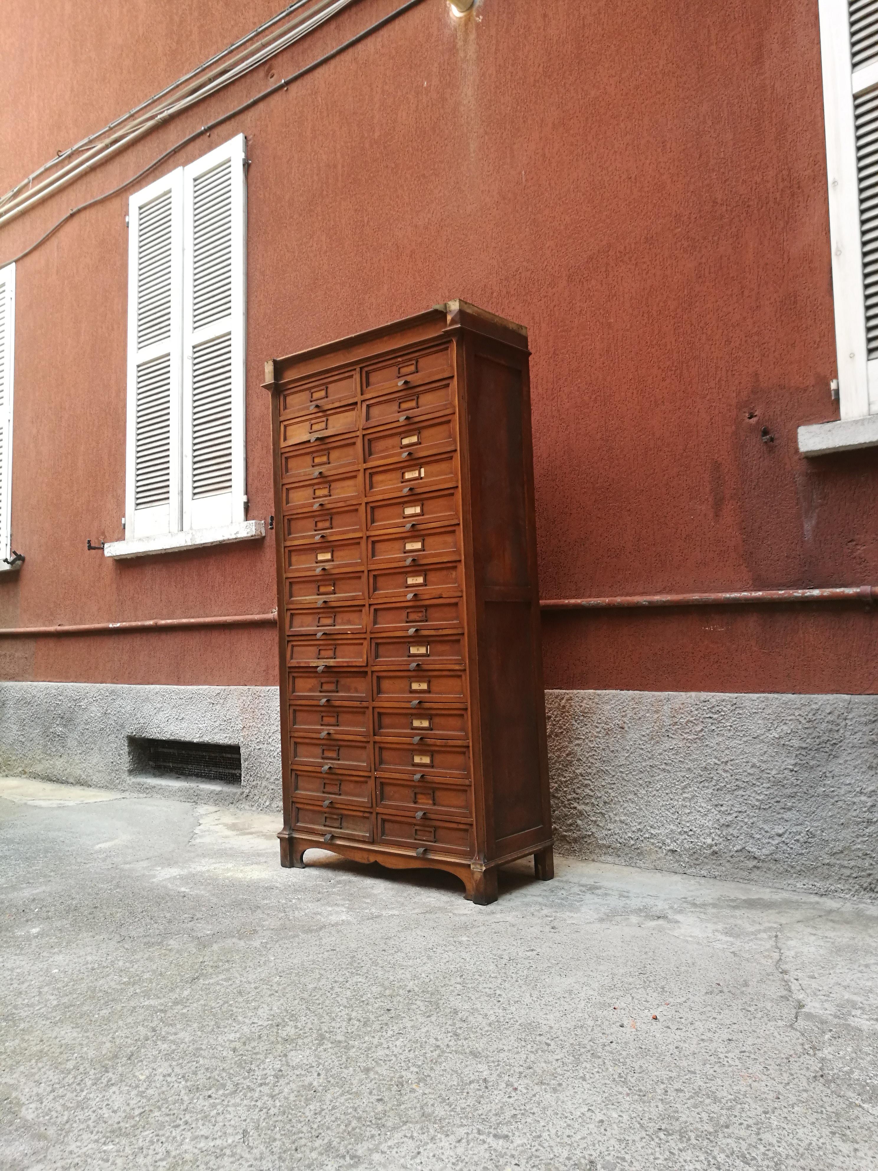 Italian mid-century wood archive stand, 1940s
Walnut archive dresser from forties, made in Italy. 28 drawers, with brass handles, were used to manage months and months of job, and still today can do this. Really high quality and grandeur make this