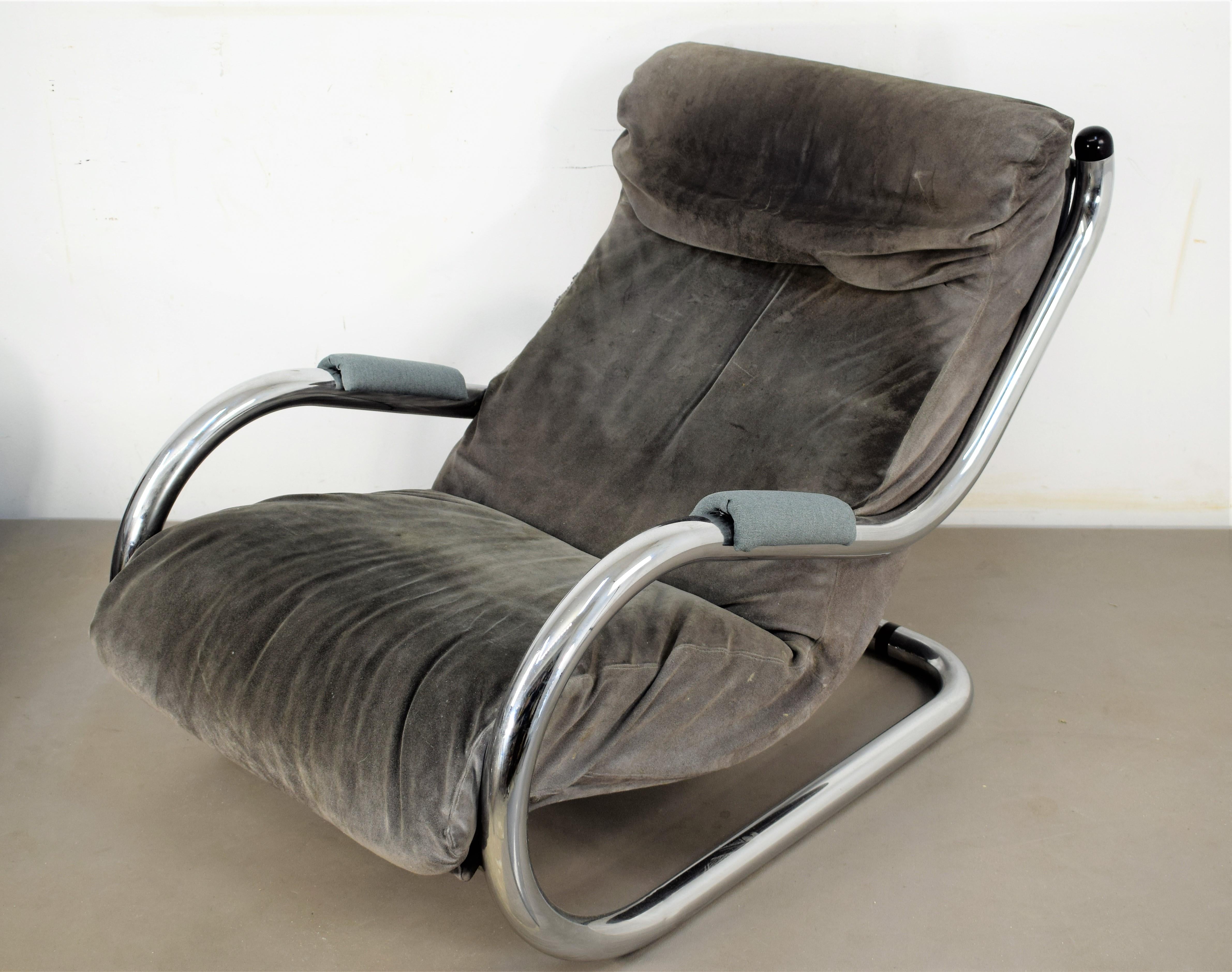 Italian armchair and pouf, 1970s.
Dimensions: 
Armchair H=75 cm; W=69 cm; D=110 cm; Height seat = 34.
Pouf H=40 cm; W=68 cm; D= 57 cm.