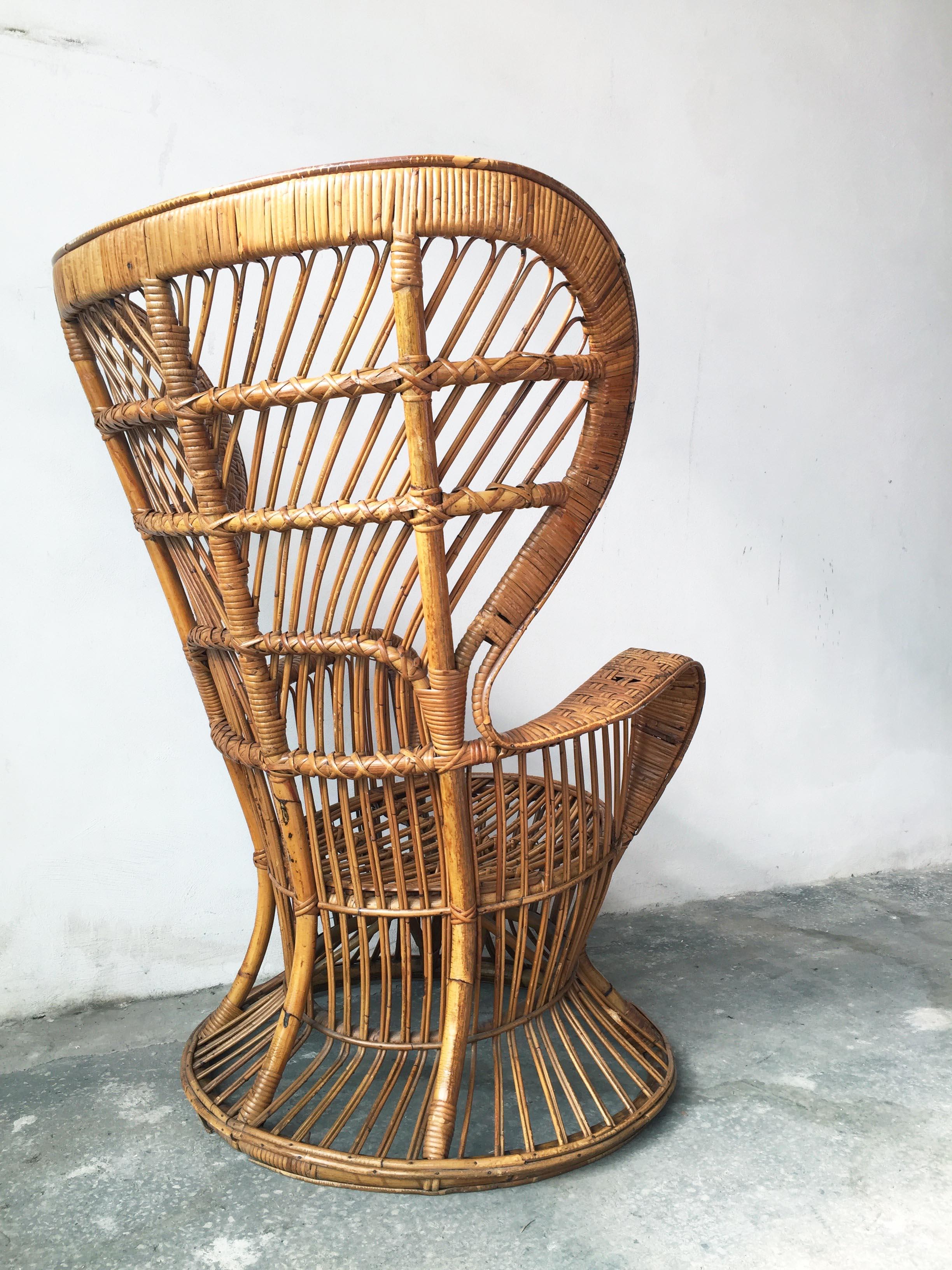 Amazing and big armchair in rattan and bamboo cane designed by Lio Carminati and produced by 