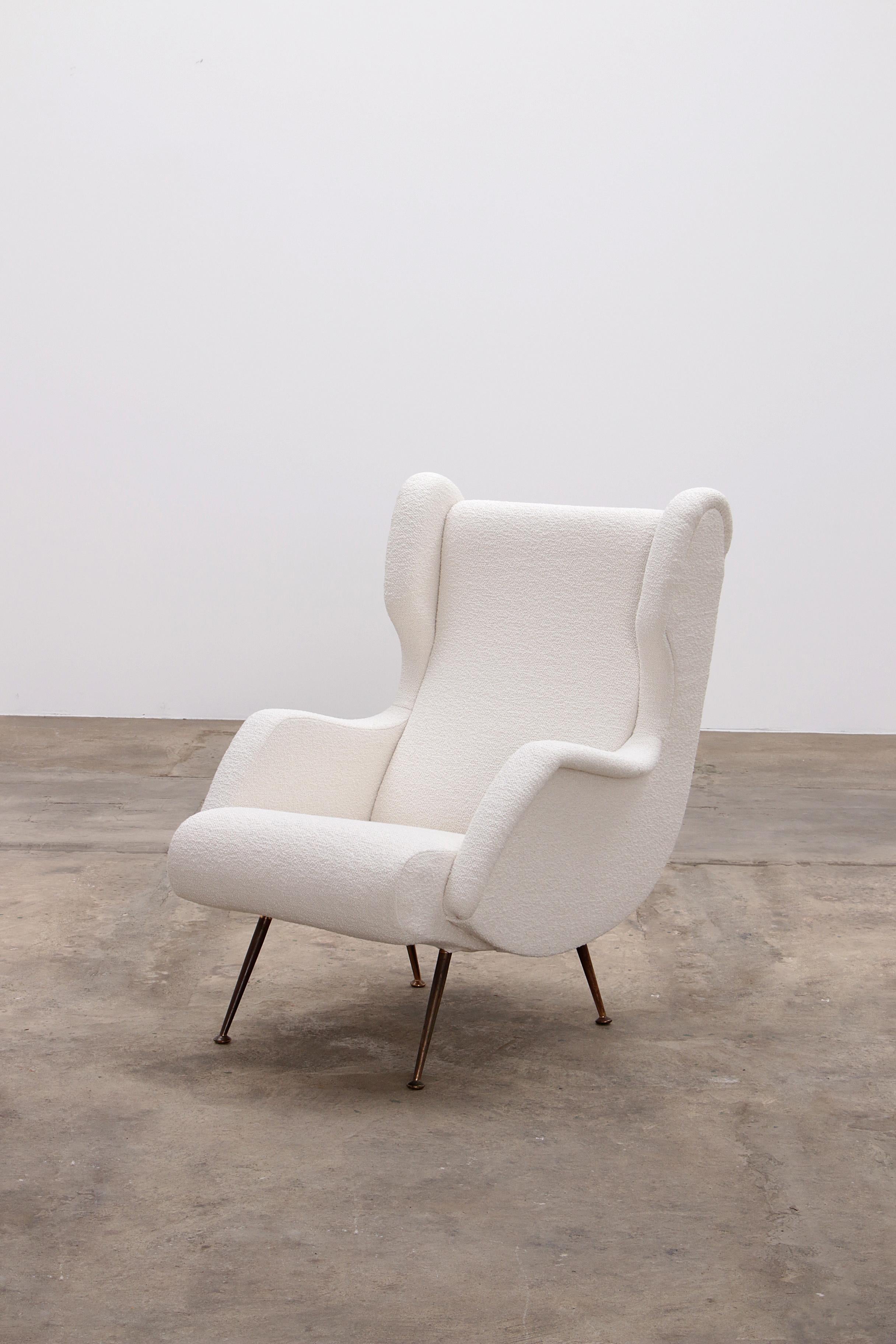 Italienischer Sessel von Marco Zanuso für Arflex, gepolstert mit Boucle, 1960

Sehr seltener Stuhl, entworfen von Marco Zanuso für Arflex in den 1950er Jahren. Dieser Loungesessel ist sehr bequem und klassisch elegant. Dieser Stuhl wurde komplett