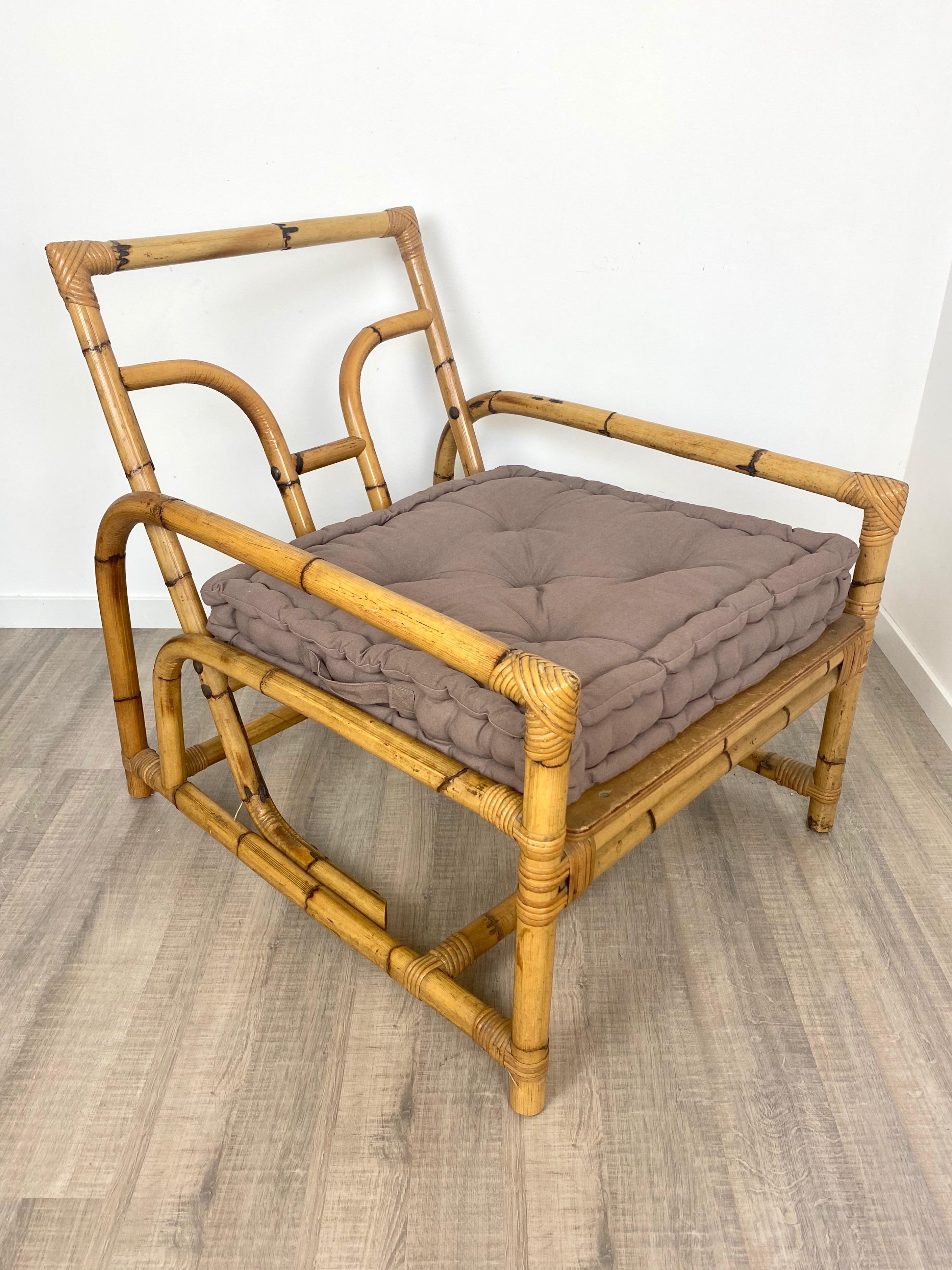 Lounge armchair in solid bamboo and rattan structure made in Italy, circa 1960s.