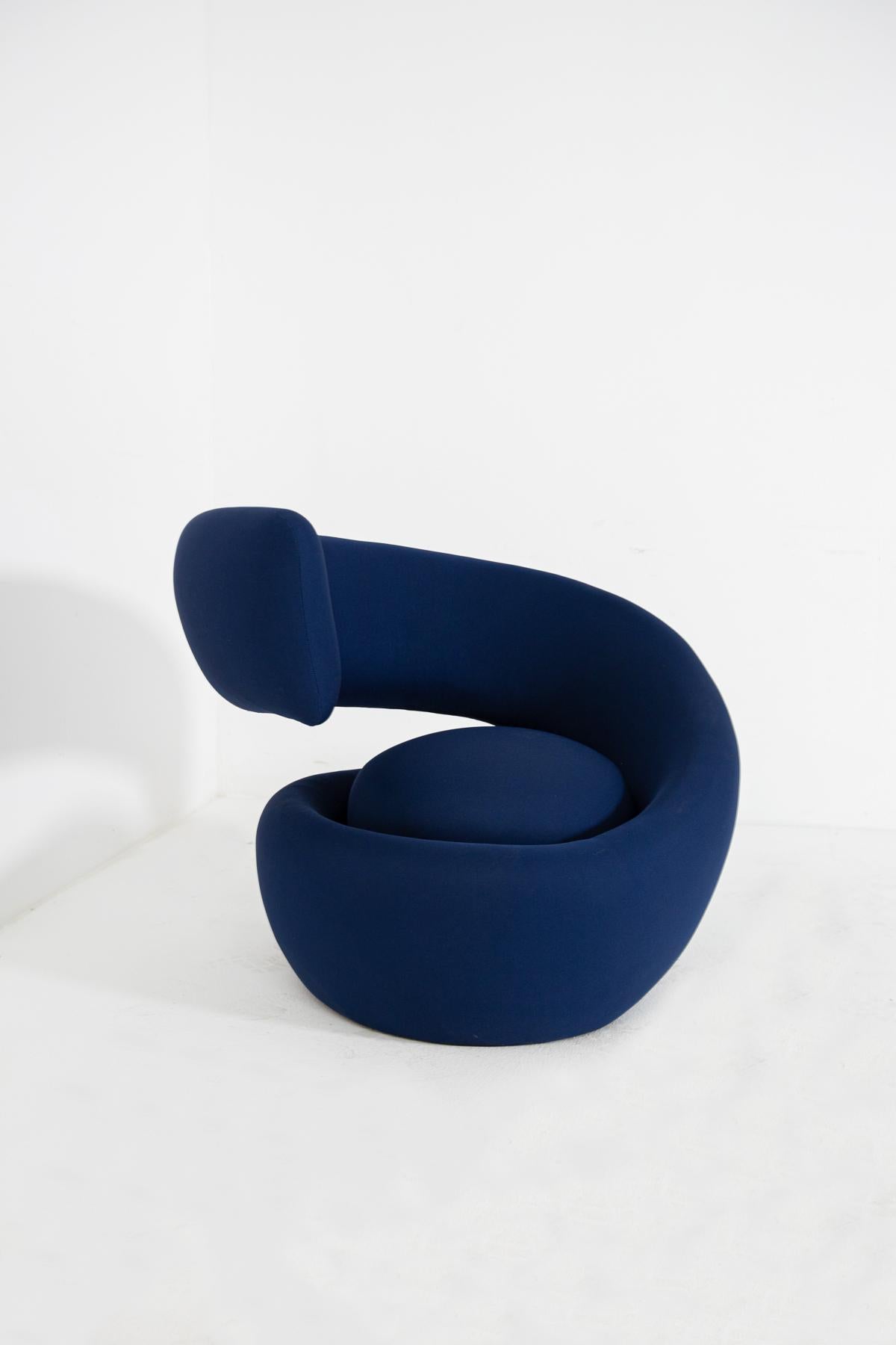 Rare spiral armchair designed by Marzio Cecchi for the Studio Most manufactory in the 1970s. The eclectic armchair has an unusual and extravagant vortex-shaped design. In fact, from its base spreads in the shape of
a spiral spreads out from its
