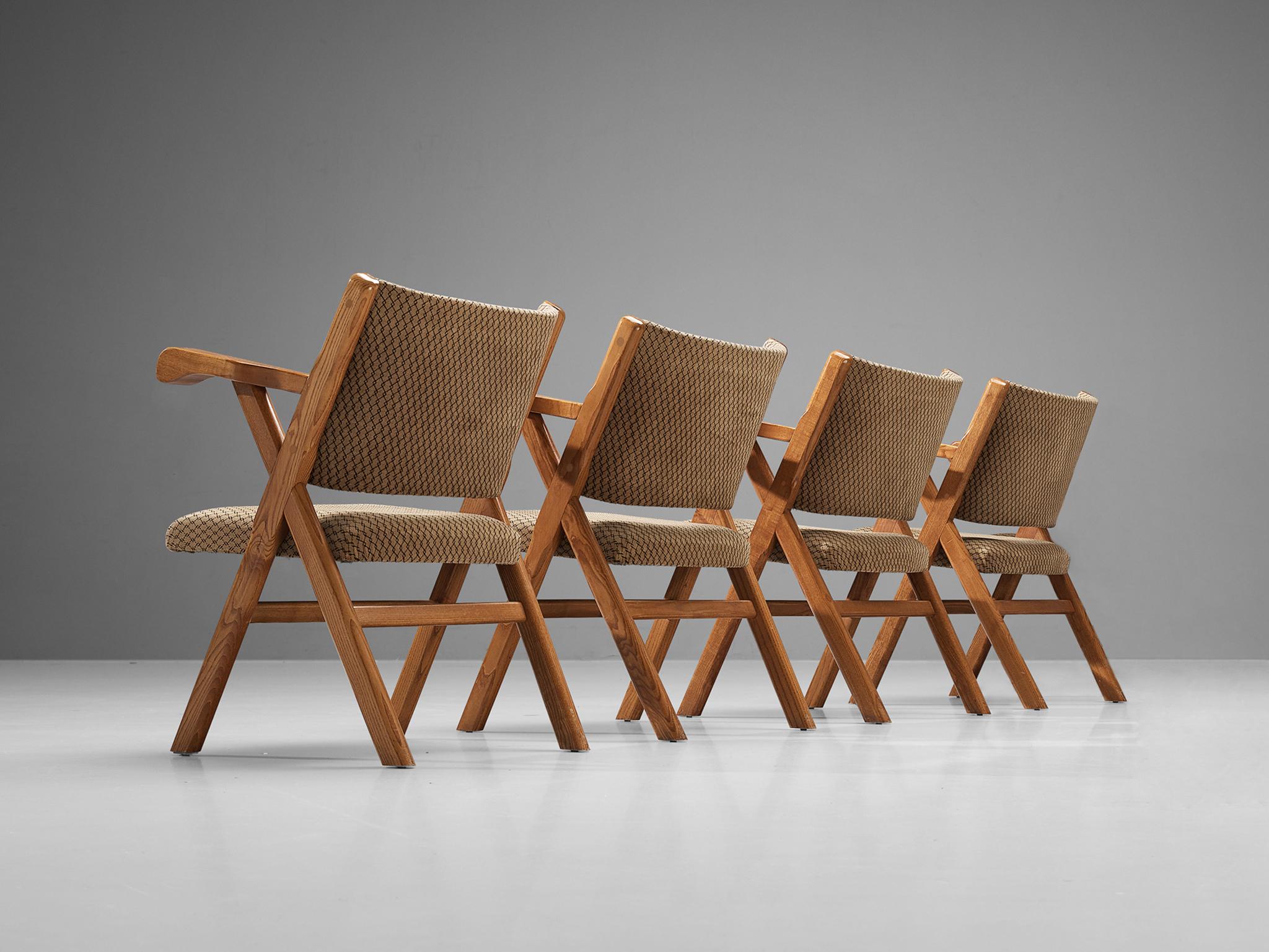 Armchairs, ash, fabric, Italy, 1960s. 

Sturdy Italian armchairs in solid ash and beige checkered pattern upholstery. The x-shaped design elevates the overall elegancy of this rustic chair. Moreover, the armrests of these armchairs show beautiful