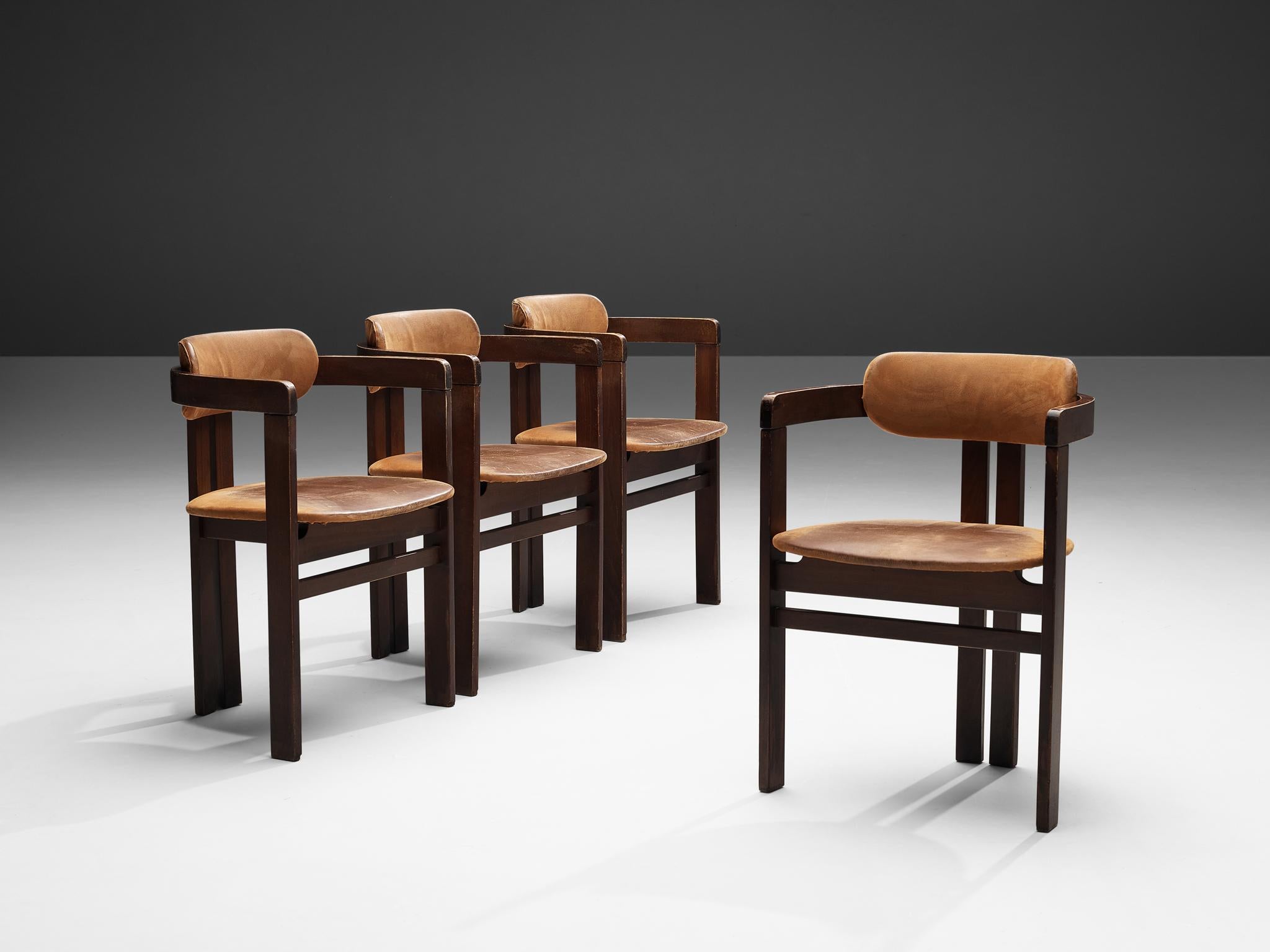Armchairs, leather, lacquered wood, Italy, 1960s

Armchairs in wood with cognac leather. The chairs have a characteristic design, clearly inspired by the Pamplona chair of Augusto Savini. The chairs are functional and straightforward, yet very