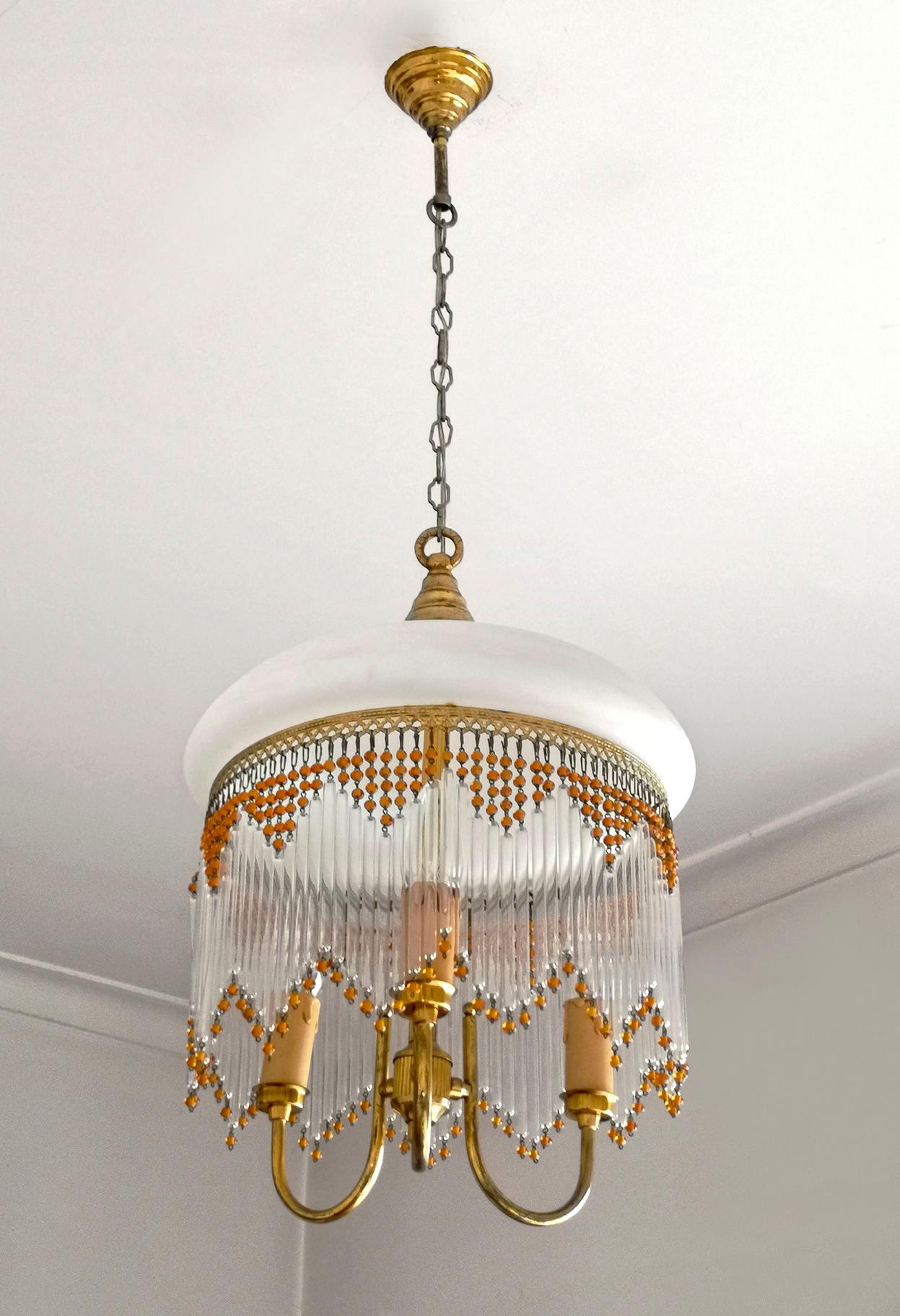 Hollywood Regency Italian Art Deco & Art Nouveau Amber Beaded Clear Glass Fringe Murano Chandelier For Sale