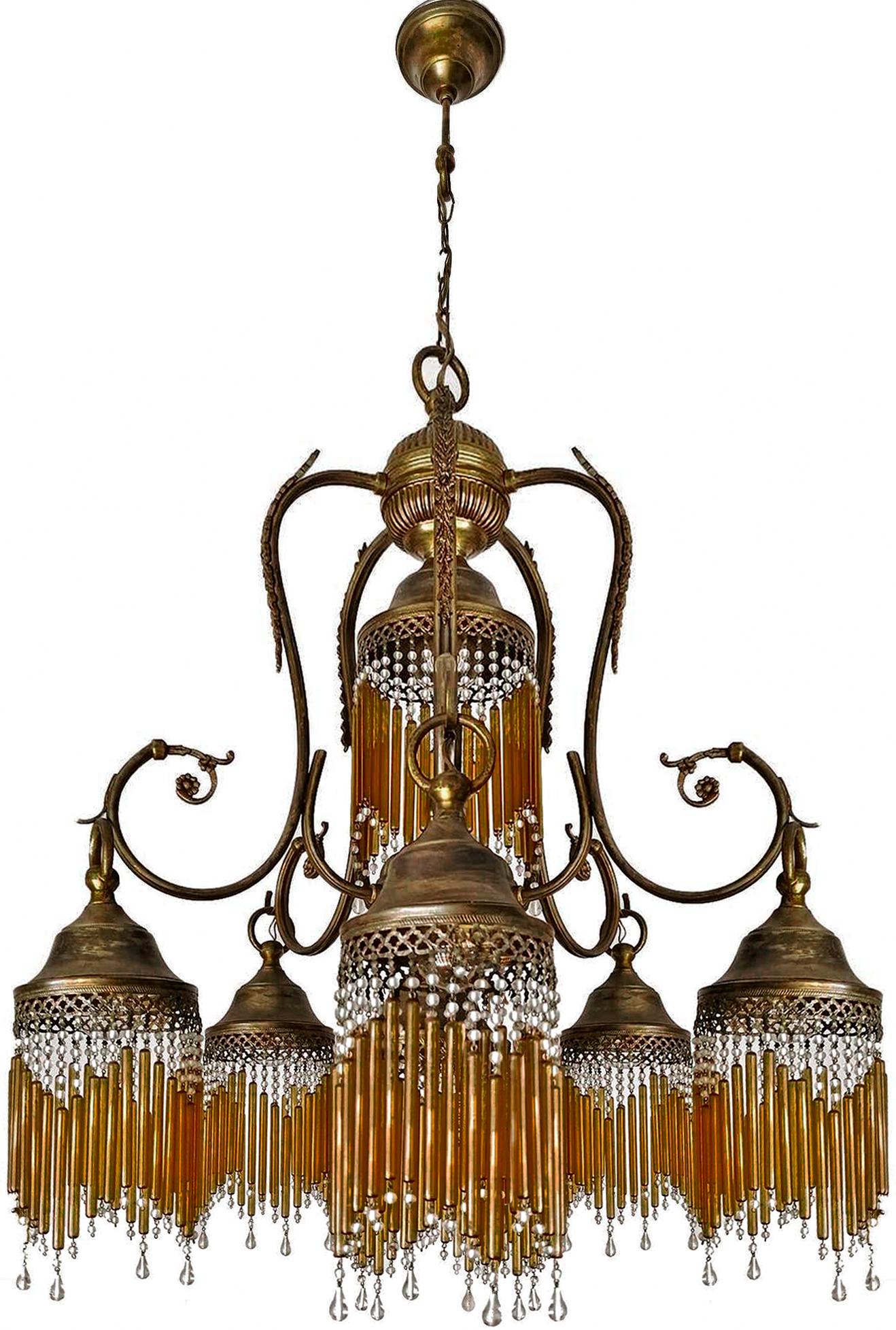 Fabulous early 20th century in clear and amber beaded glass Art Deco or Art Nouveau chandelier.
Dimensions:
Height: 47.25 in/chain=8 in. (120 cm/chain=20 cm)
Diameter: 24.41 in. (62 cm) 
7 light bulbs E14/ good working condition/European