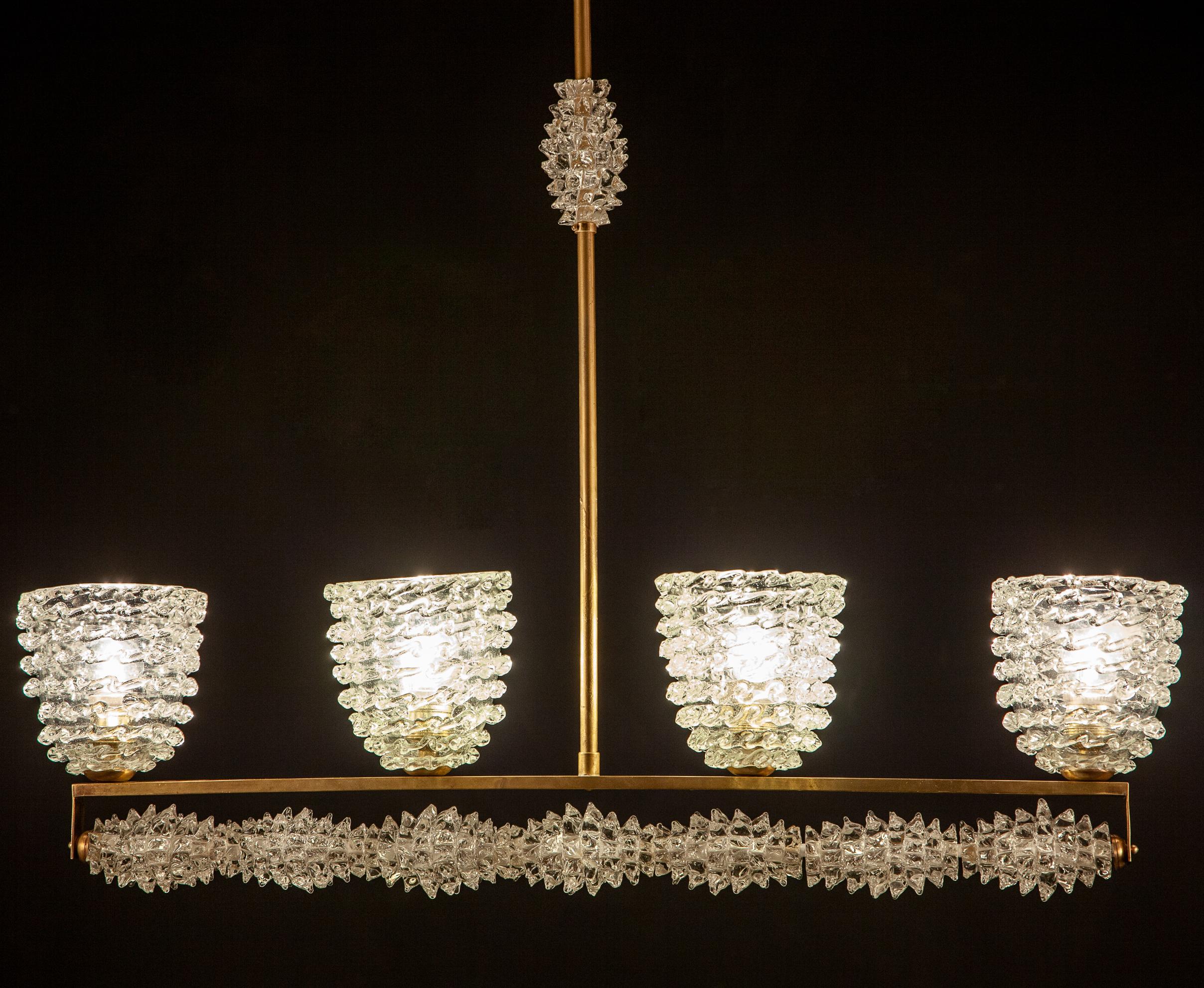 Superb Italian Art Deco Rostrato Murano glass Gio Ponti style chandelier attributed to Barovier & Toso.
Four elegant hand blown cups supported by a linear brass frame.
Glasses in perfect condition.
 