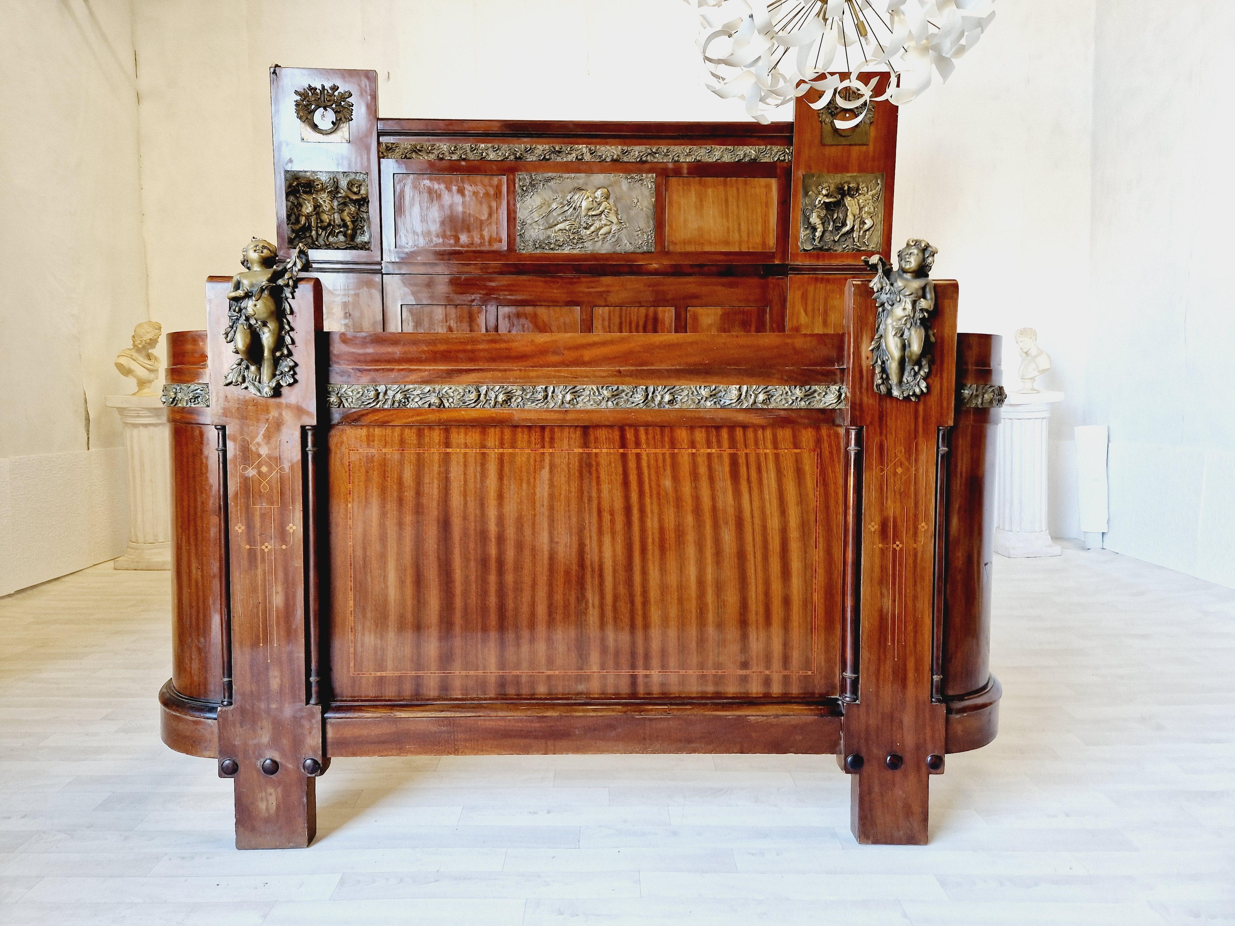 
We are delighted to offer for sale this Fabulous Art Deco Period Bed from Walnut and Bronze

This Antique Italian wood veneer Bed from the Art Deco Period, combines elegance and dramatic style with its intricate design and stunning solid bronze