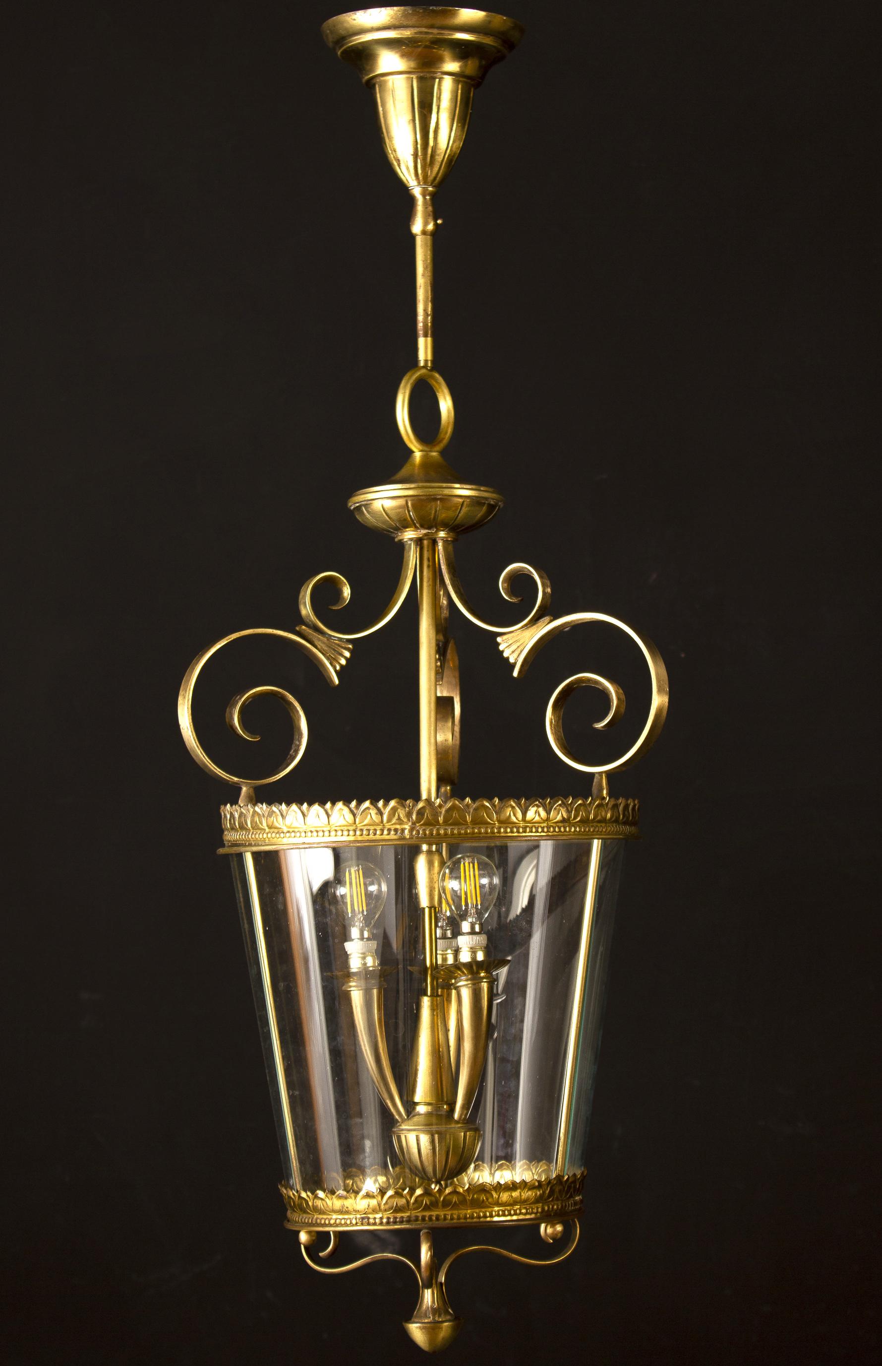 Amazing Italian Art Deco brass lantern or pendant.
Three E 14 light bulbs. We can wire for your country standards.