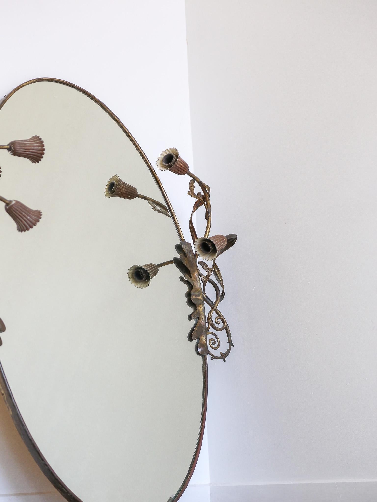  

Italian Art Deco brass oval wall mirror 1950

These mirrors were characterised by their frames made of brass, featuring sleek and geometric designs with clean lines. During the 1950s, brass was a popular material for home decor due to its