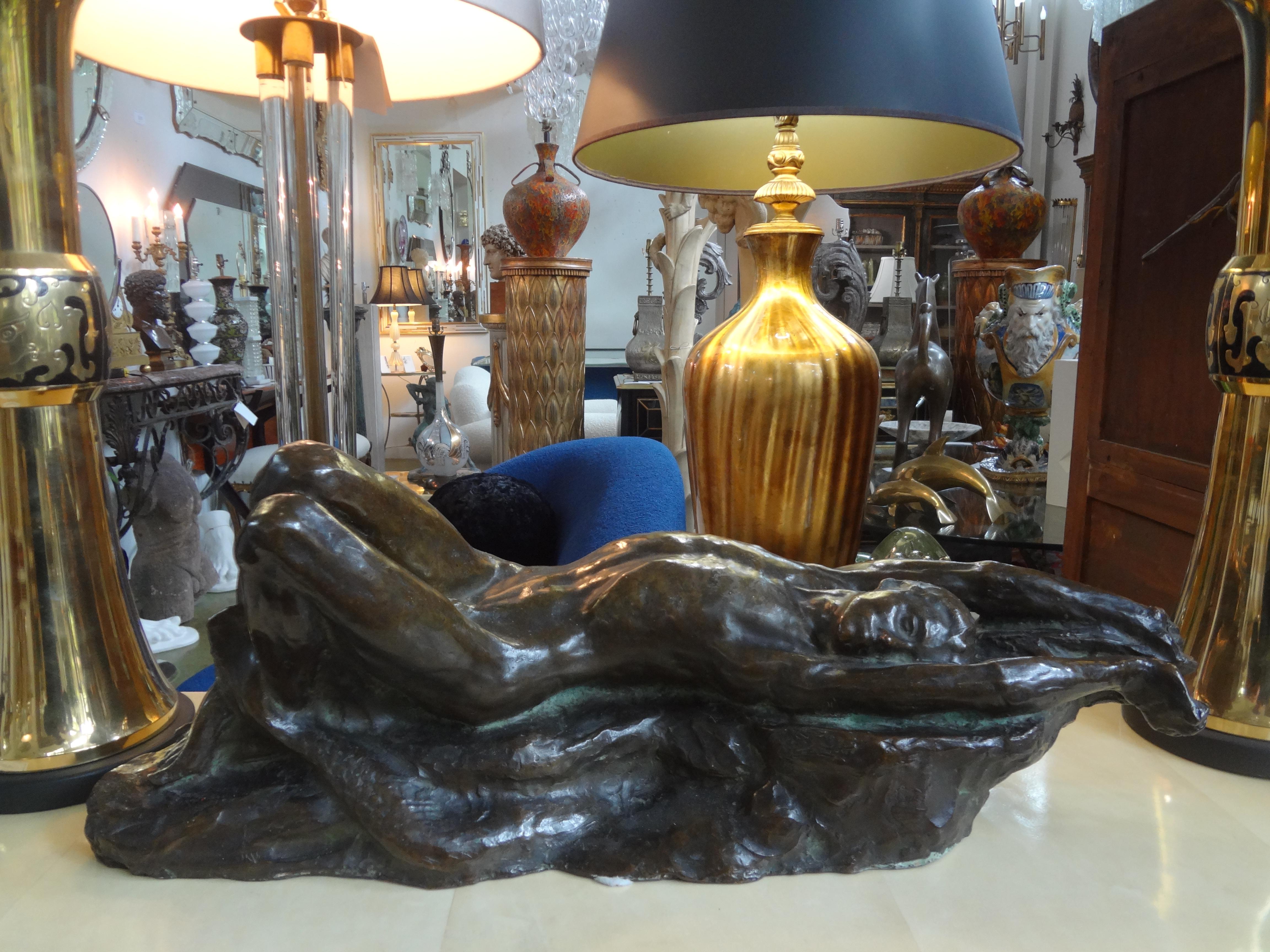 Italian Art Deco Bronze Sculpture Of A Nude Male.
We offer a handsome Italian bronze sculpture of a reclining nude male that dates to the 1940's. 
Beautiful form and great patina!