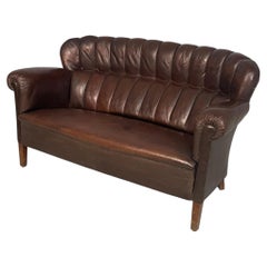 Italian Art Deco brown leather two seater sofa by Saracchi, 1930s