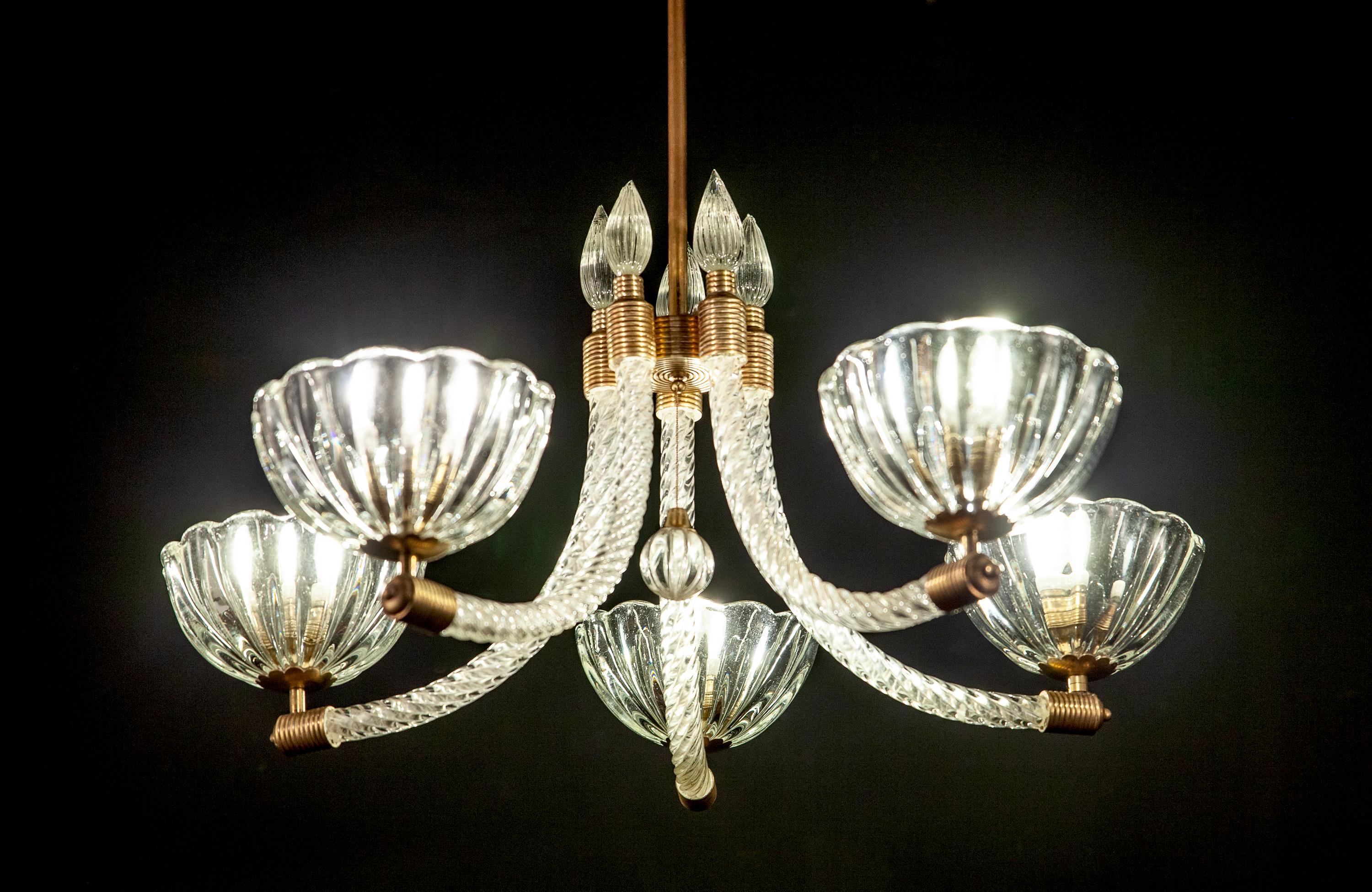 Elegant brass mounted Art Deco five arms Murano glass chandelier by Barovier & Toso.
We can shorten the rod on request.

 