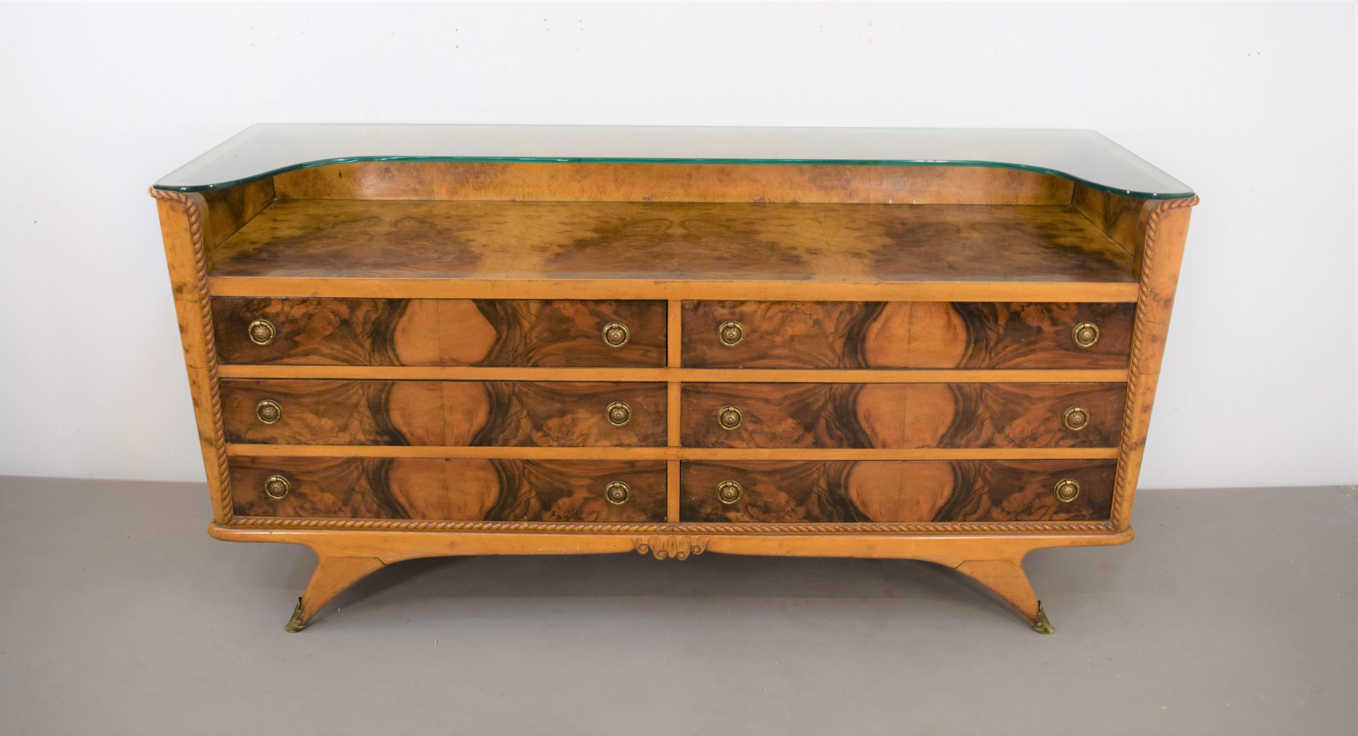 Italian Art Dèco chest of drawers, 1940s.
Dimensions: H= 80 cm; W= 173cm; D=55 cm.