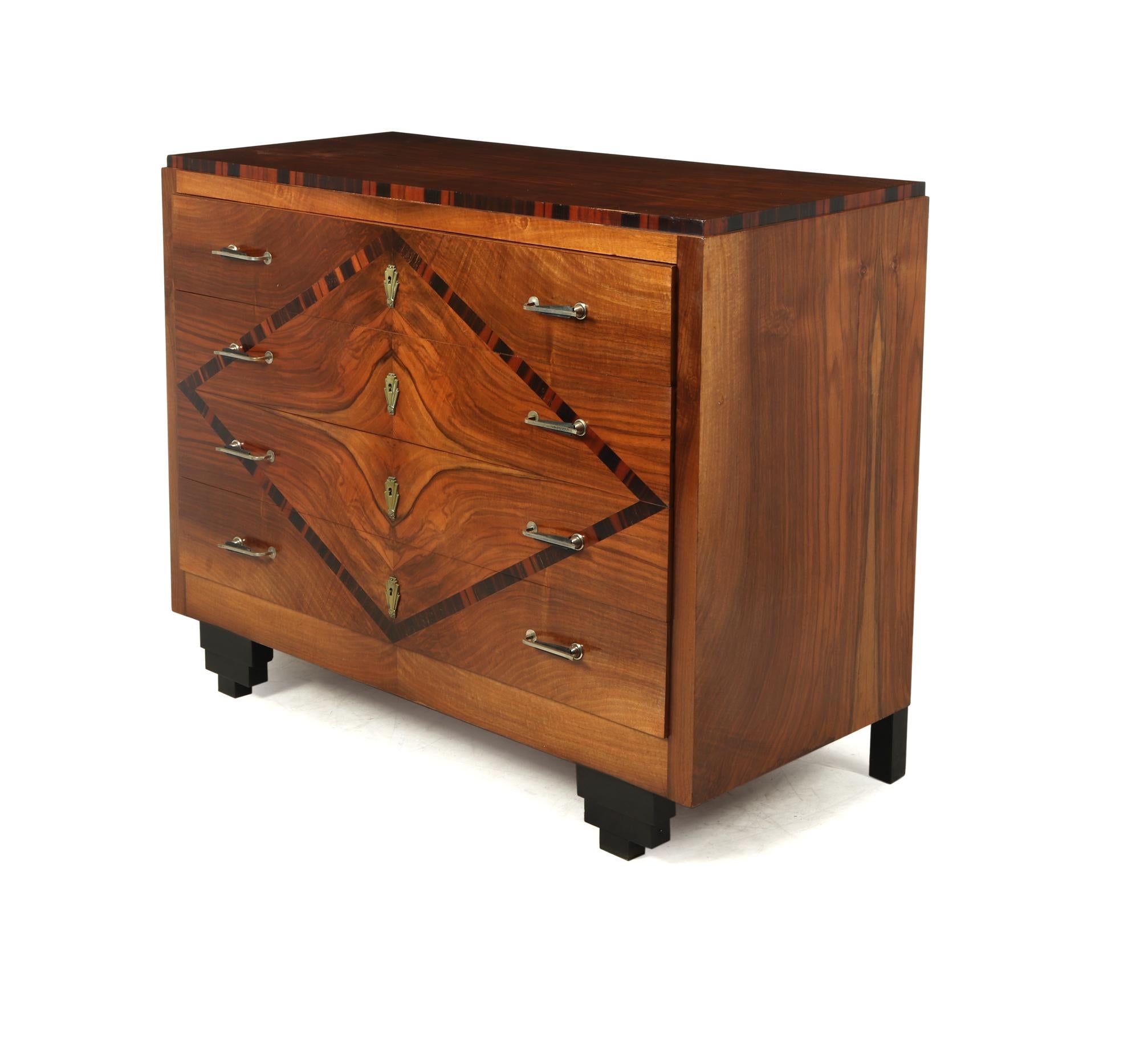 A four long drawer chest produced in Italy in the 1930’s in Walnut with Macassar Ebony cross banding and inlay the chest has been fully polished and is in excellent condition throughout

Age: 1930

Style: Art Deco

Material: Walnut and