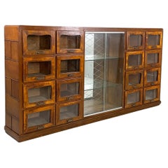 Italian art deco chest of drawers with display cabinet in wood and glass, 1930s