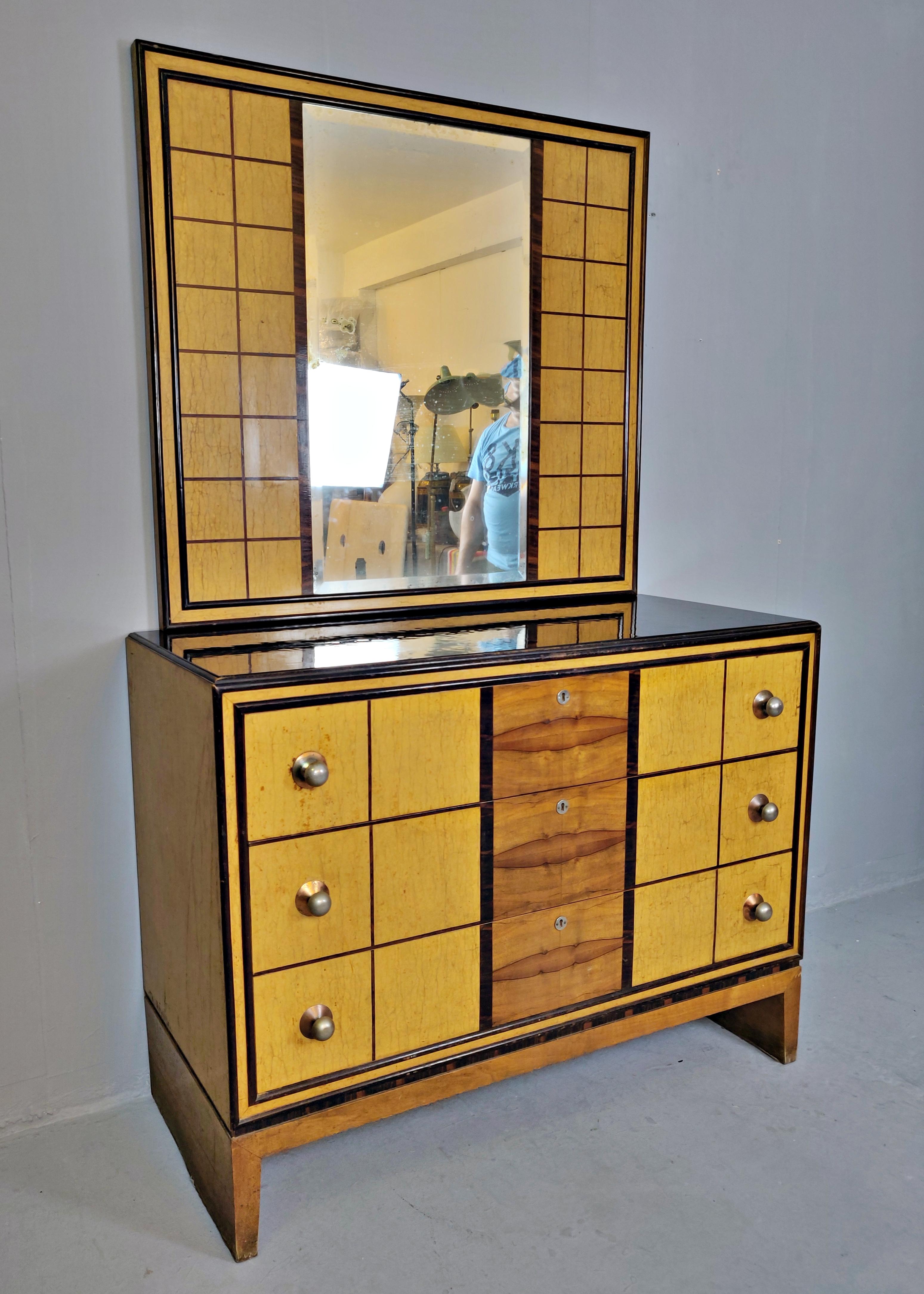 Italian Art Deco chest of drawers with standing mirror.
