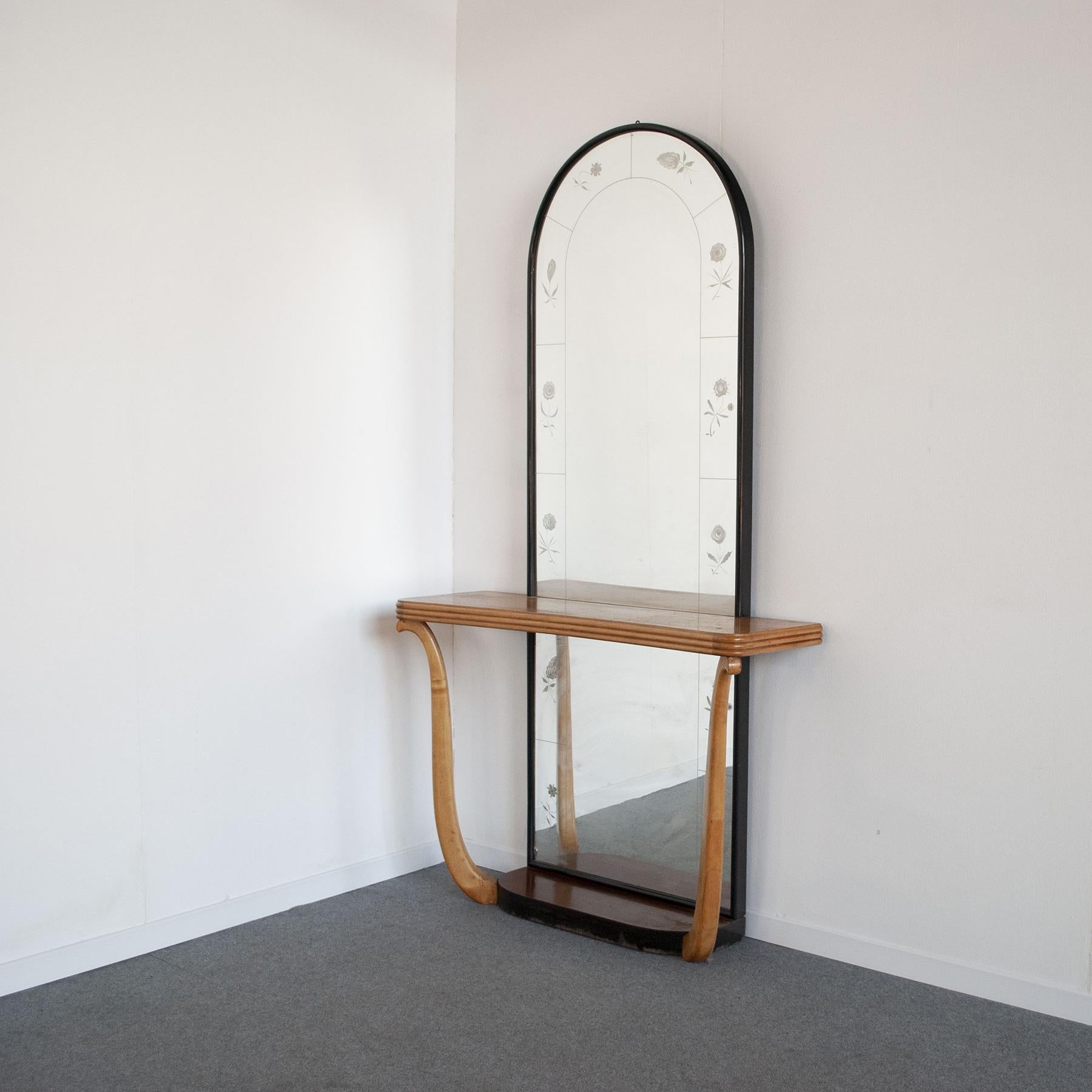 Console in curved wood with full-height worked mirror, Art Deco style of the late 40s.