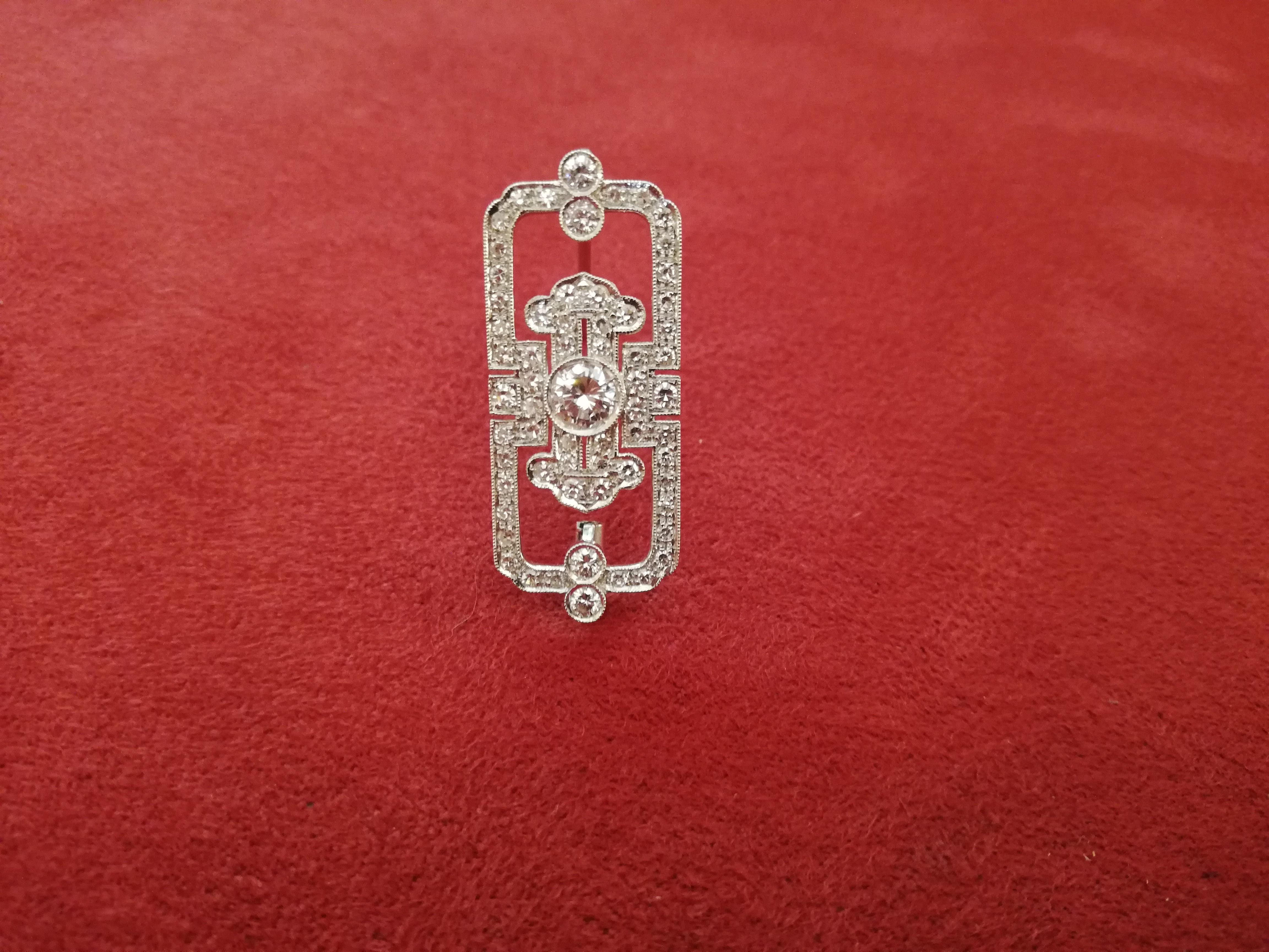 One of a kind Italian Art Deco diamond brooch size small. 

Diamond: 
     - edge:     0.80ct
     - central:  0.25ct

Weight:  4.70gr
