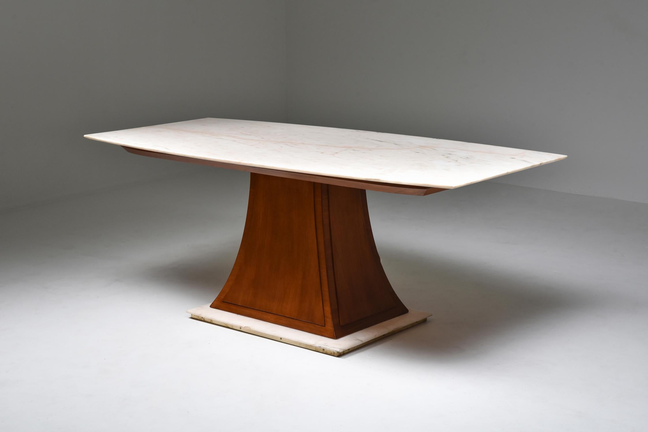 Marble; dining table; Trapezoid base in teak; Italian design; Japanese influences; Japan inspired; 1940s; Italy; Art Deco;

An Italian Japan-inspired dining table with a marble top resting on a trapezoid base in teak, made in the 1940s. A stunning