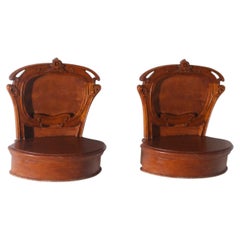 Italian Art Deco-era wall-mounted bedside tables with floral inlays