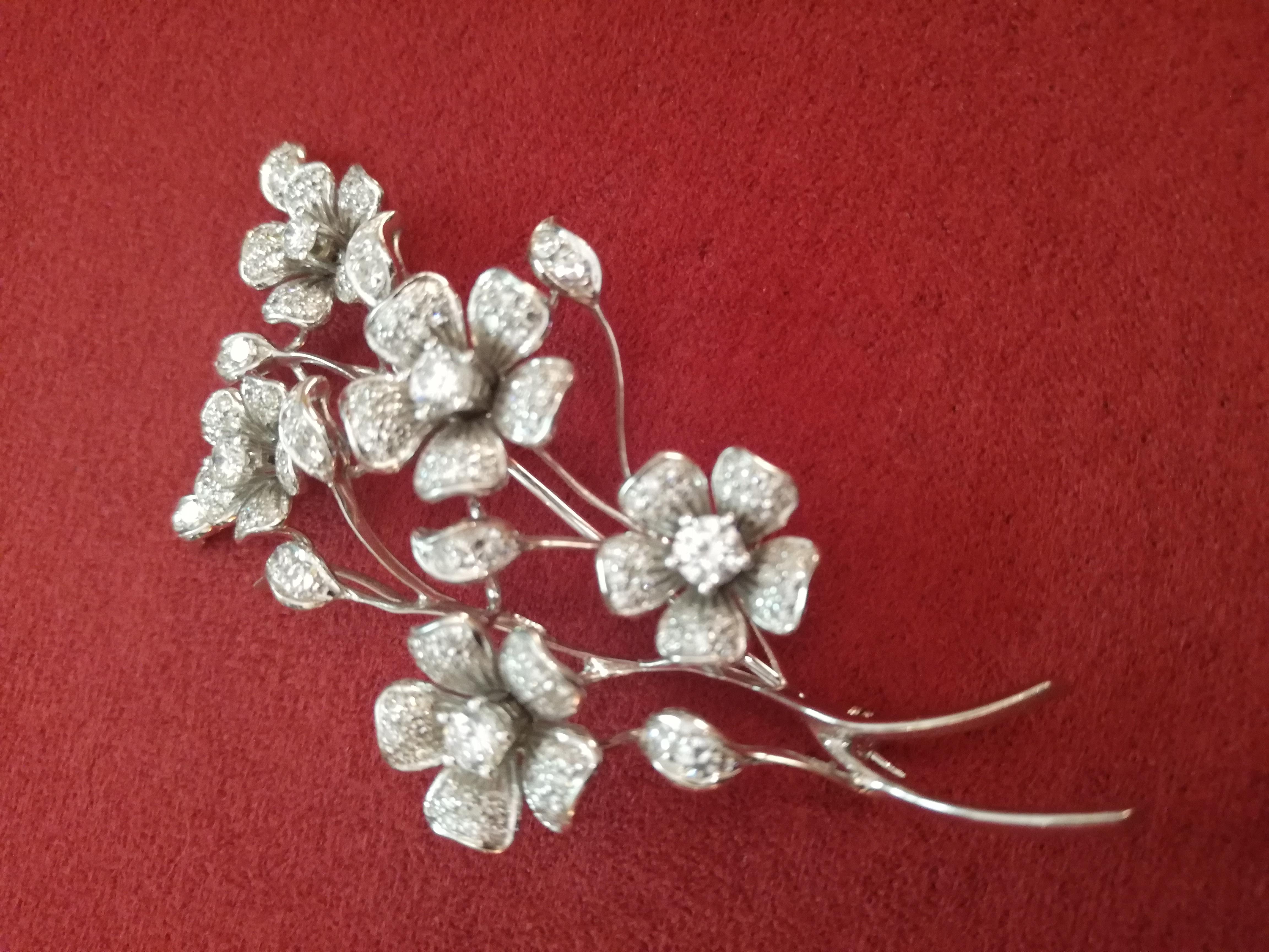One of a kind Italian Art Deco flower bouquet diamond brooch. This is an impressive late 20th century Bouquet Brooch set in 18K white gold. Crafted entirely by hand this spectacular pin depicts a posy of five flowers accented with diamonds ( 3.80